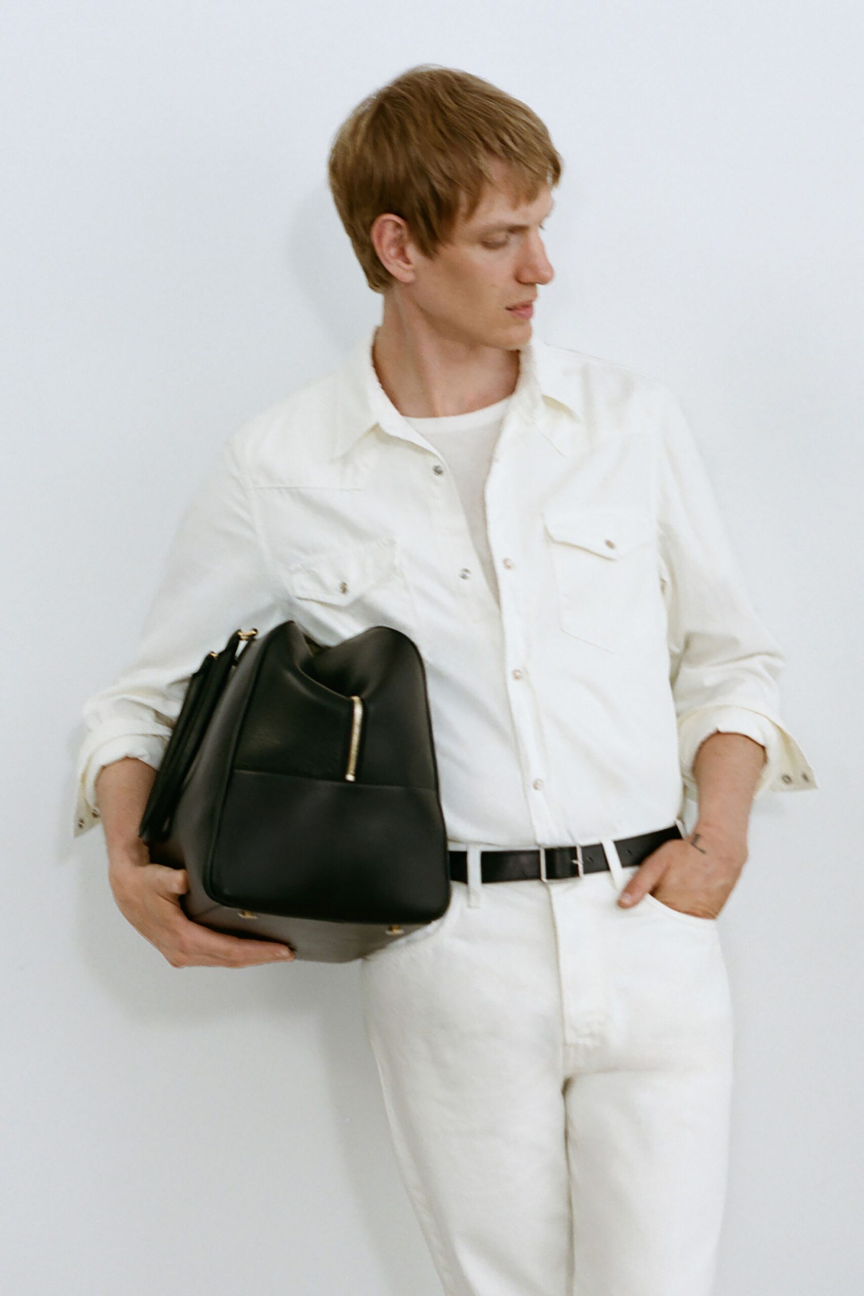 white shirt and pants with black accessories