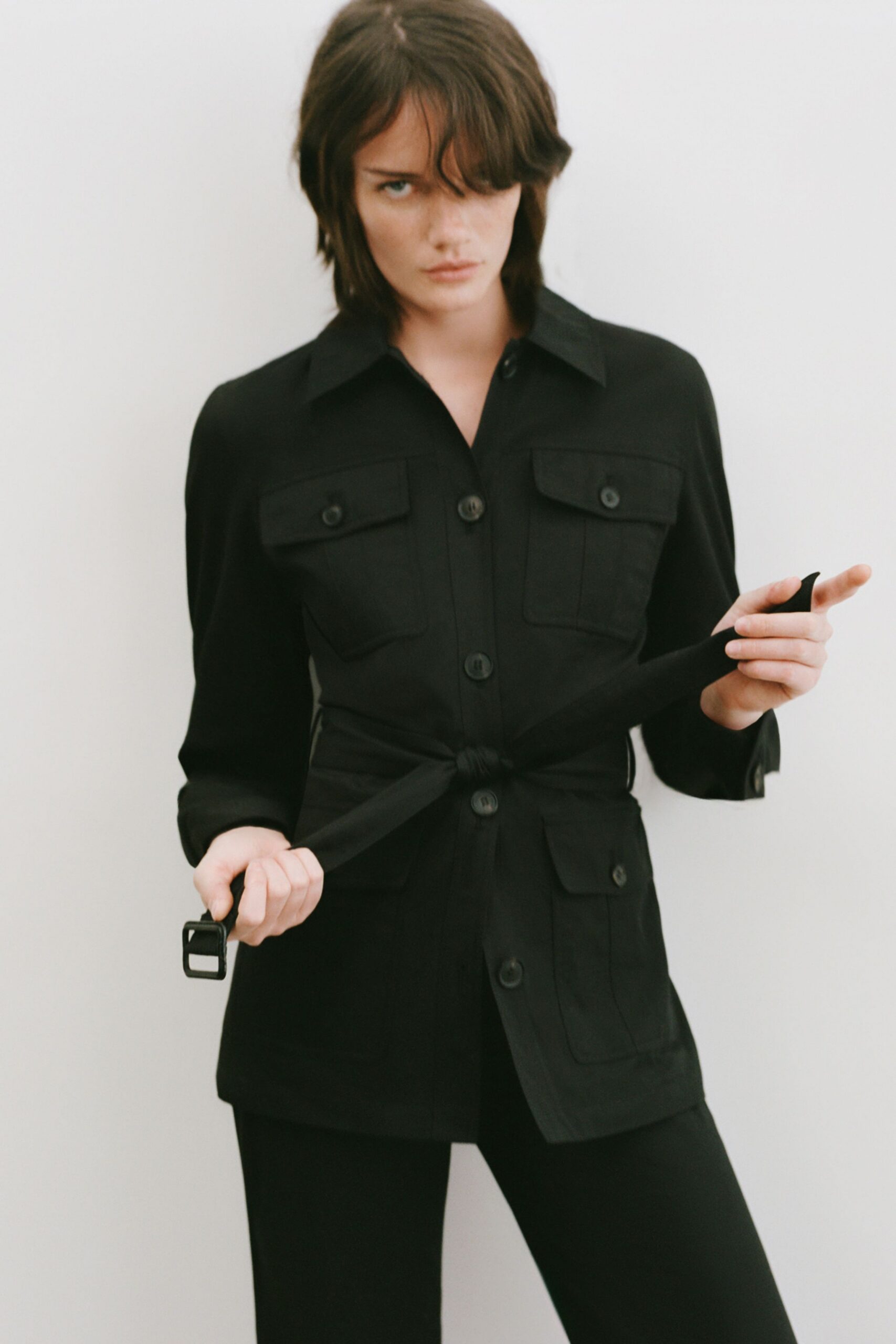 black fitted jacket and pants