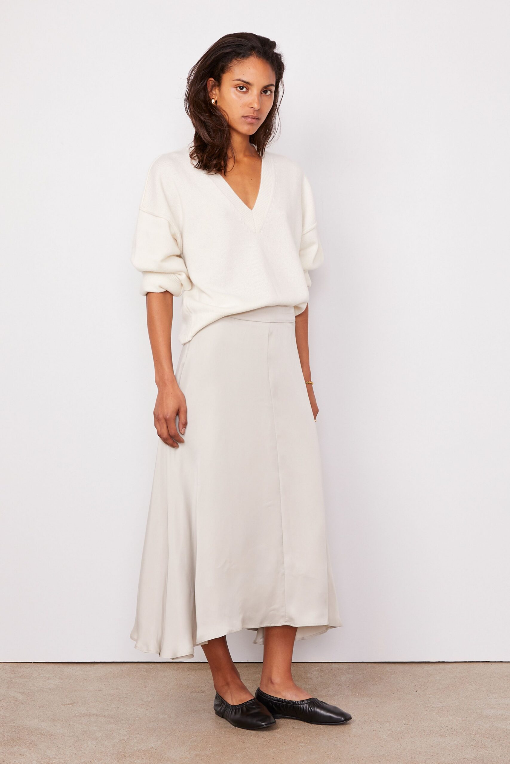 beige silk fitted a-line flowing midi skirt