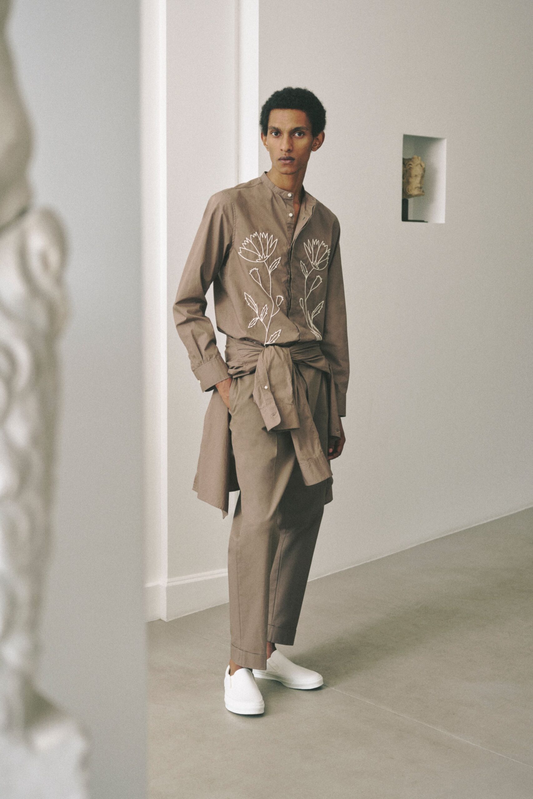 beige embroidered shirt with tailored pants