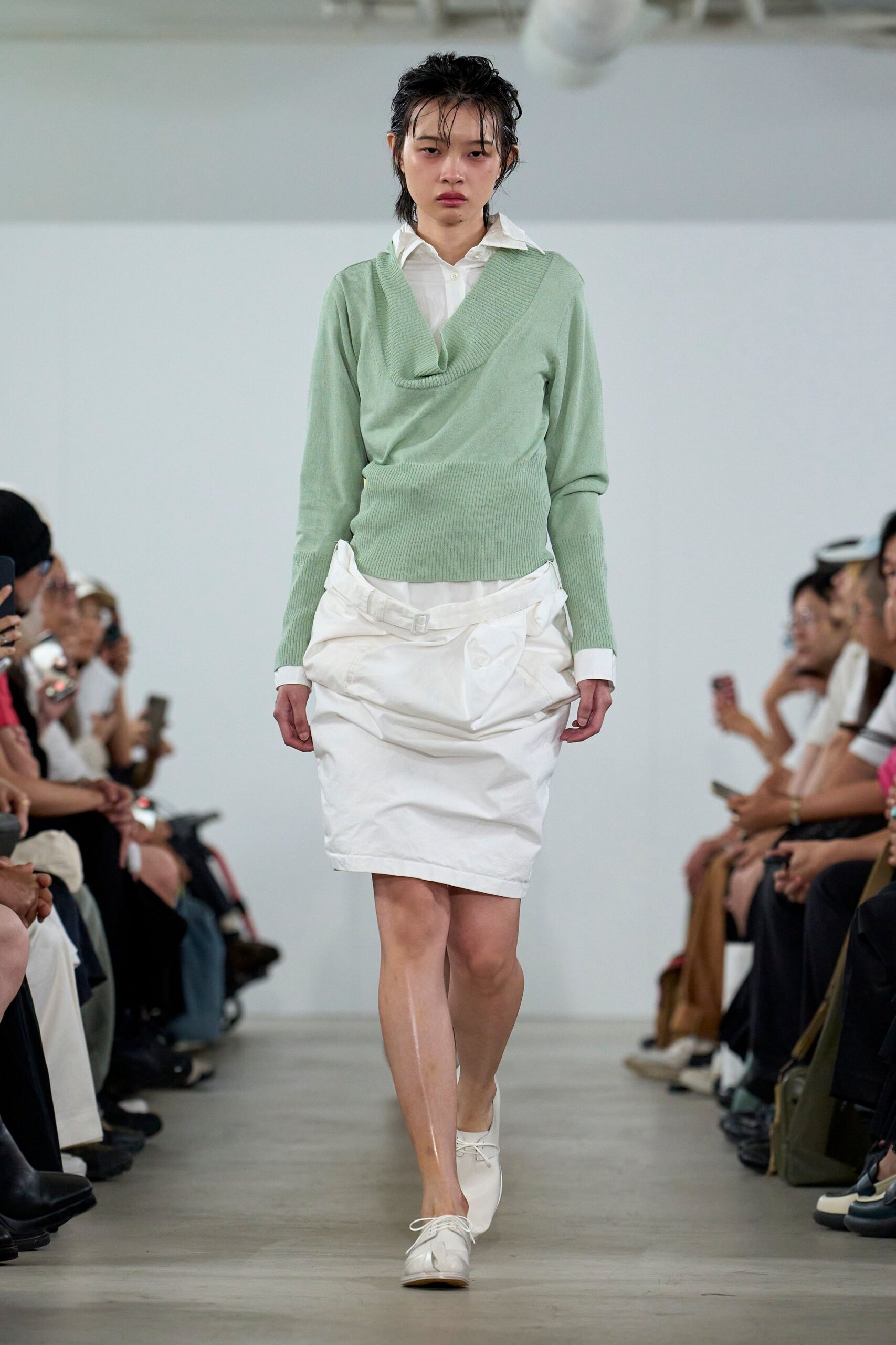 green fitted top white pleated skirt