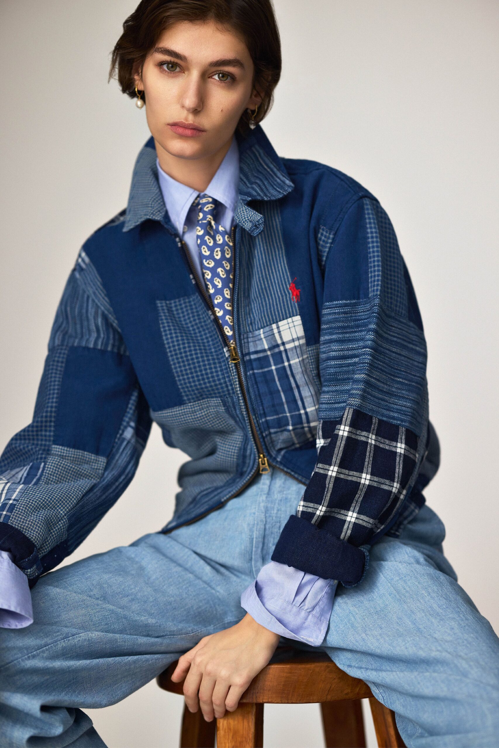 blue patchwork jacket with shirt and denim pants