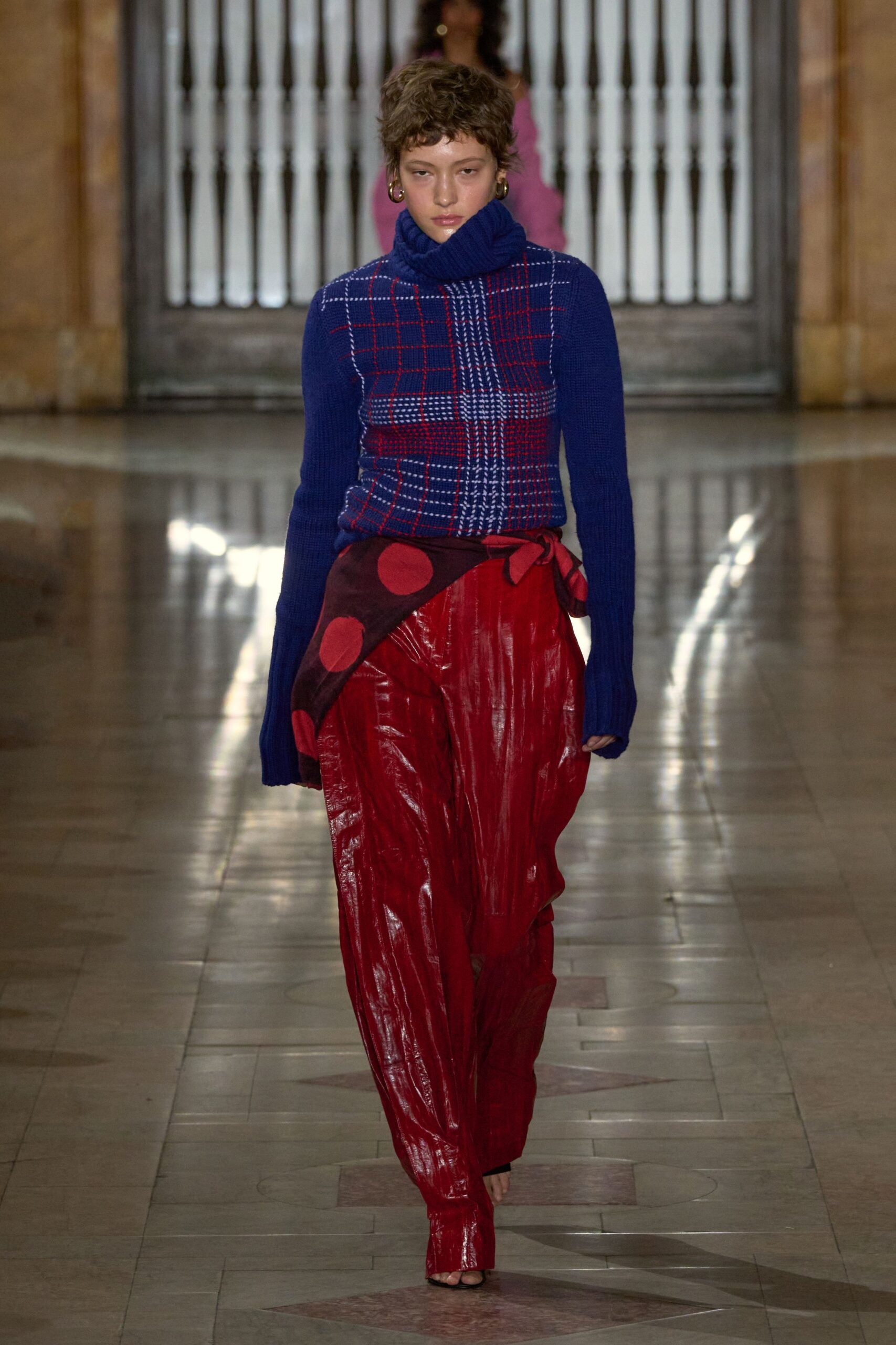 blue checked sweater red leather pants