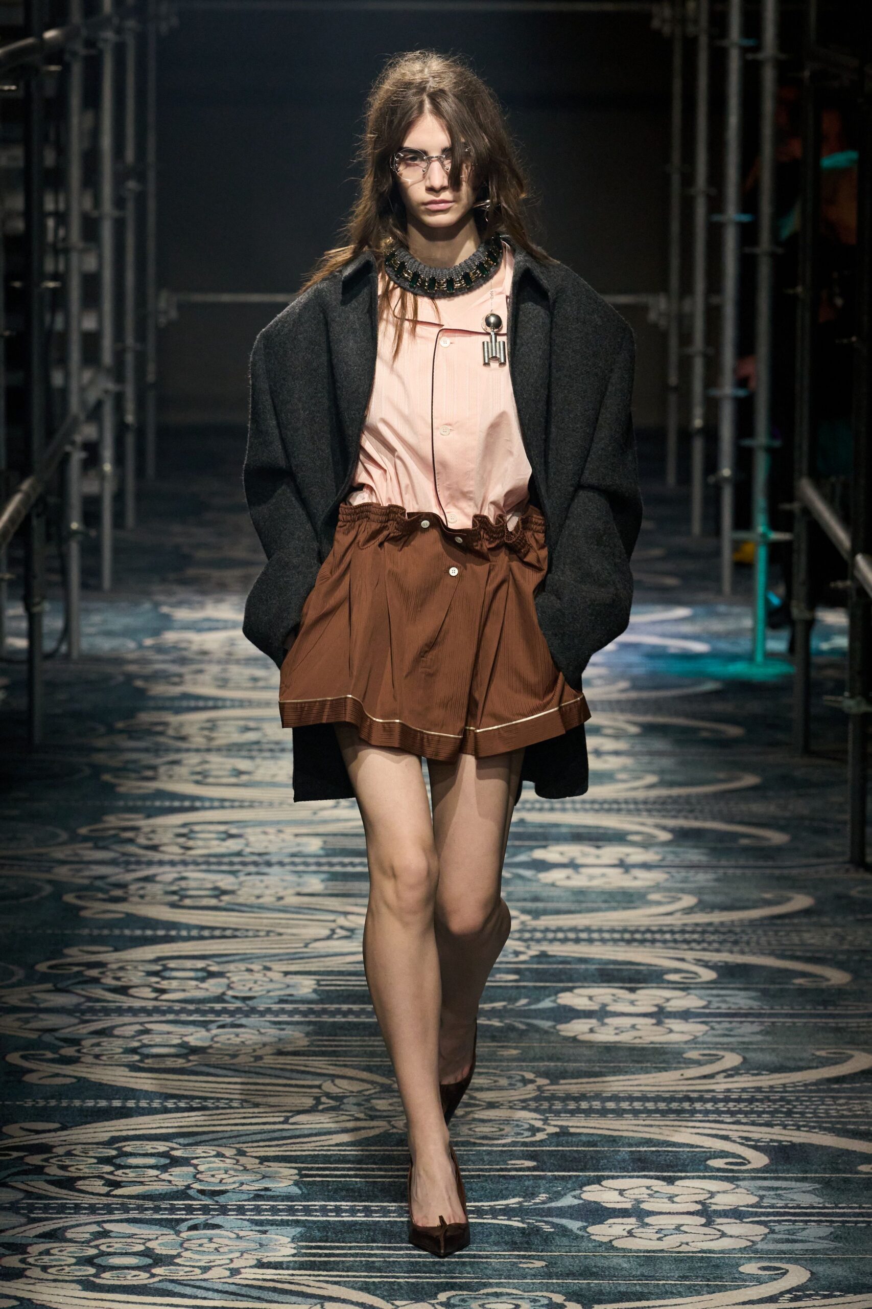oversized black coat with pink blouse