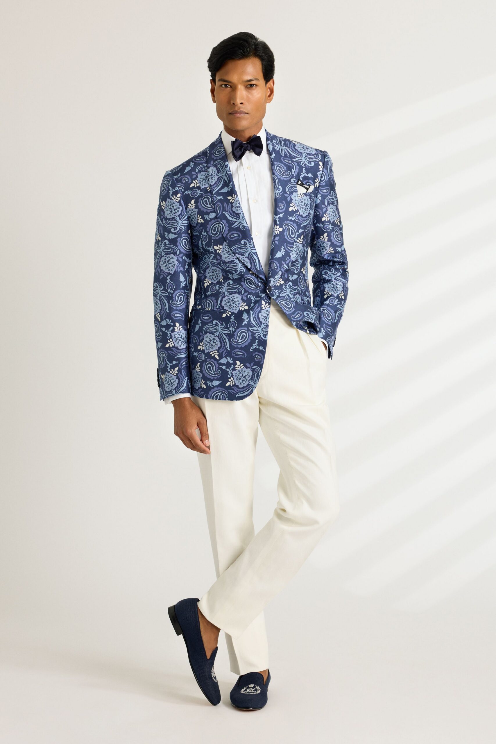 blue embroidered blazer with white pants
