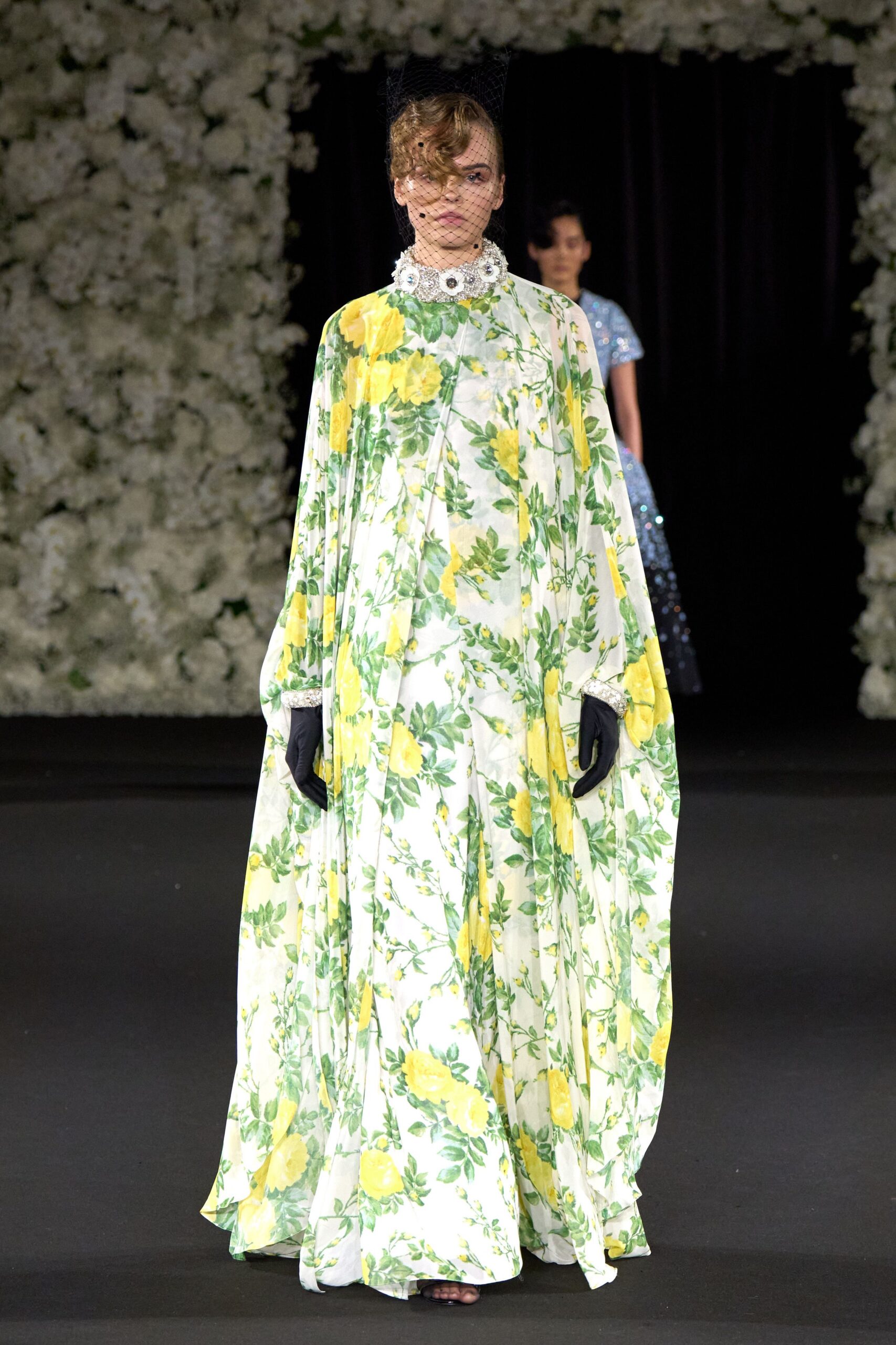 white silk long-sleeve high-neck relaxed floral draped gown