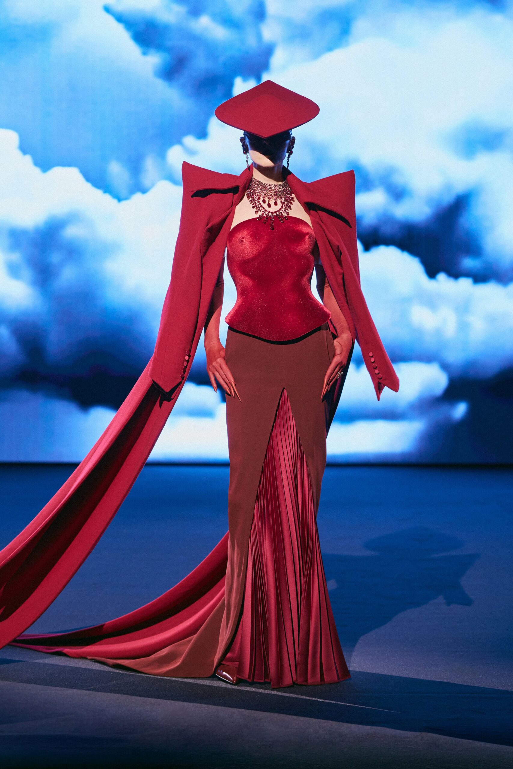 red silk sleeveless high-neck fitted pleated draped gown