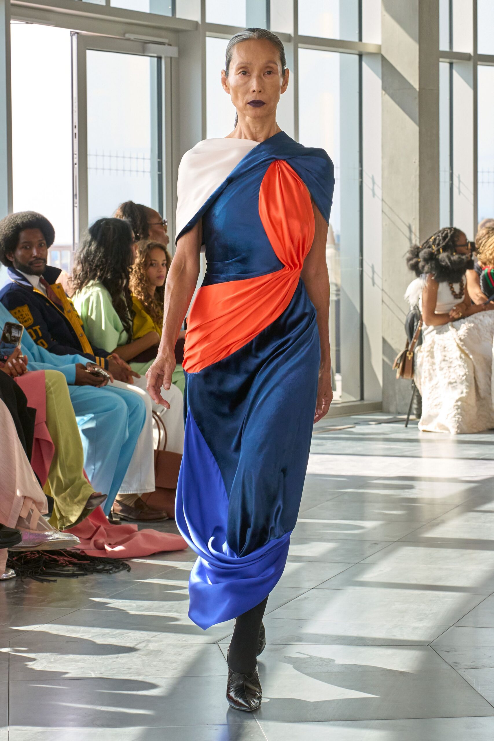 blue and orange draped midi dress with heels