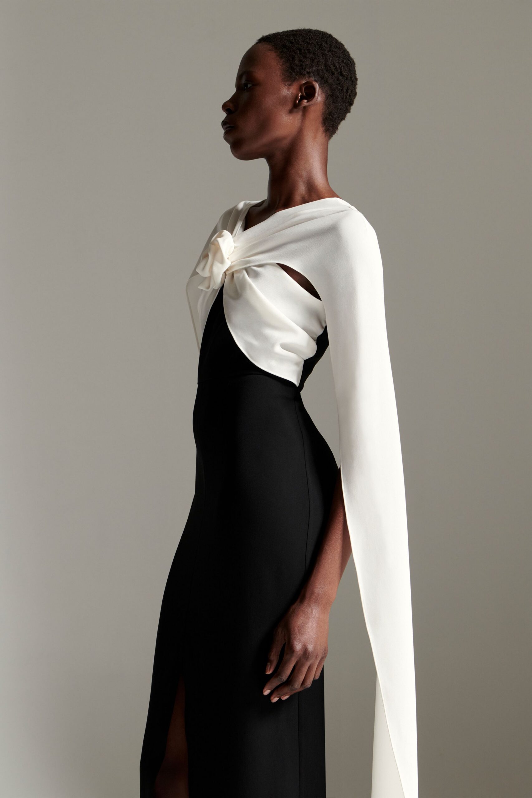 black and white draped gown