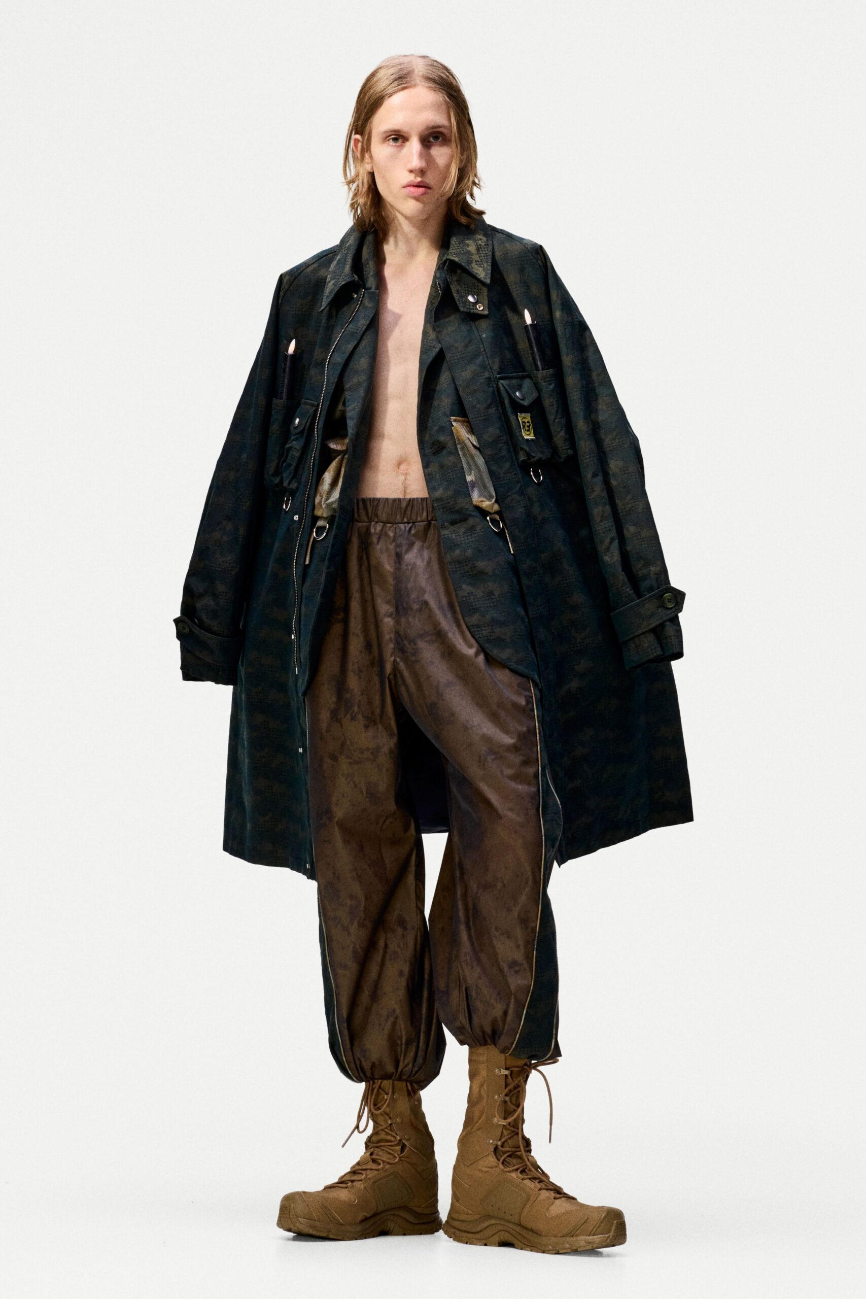 oversized black coat with relaxed brown pants