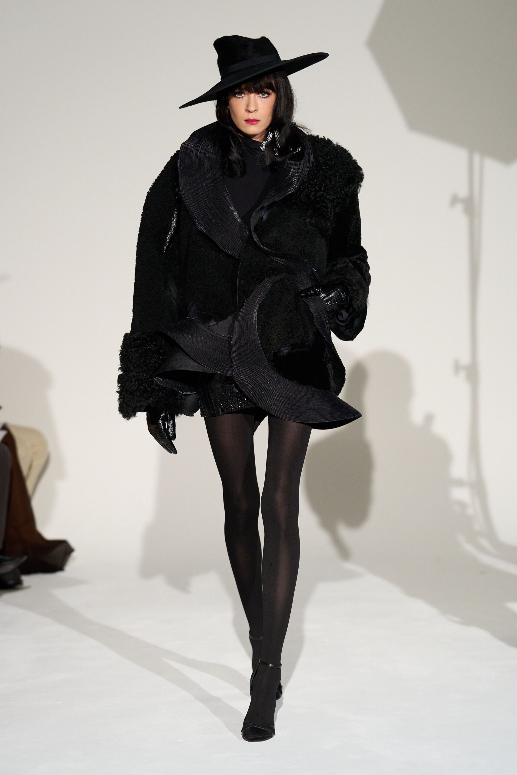 black oversized fur coat