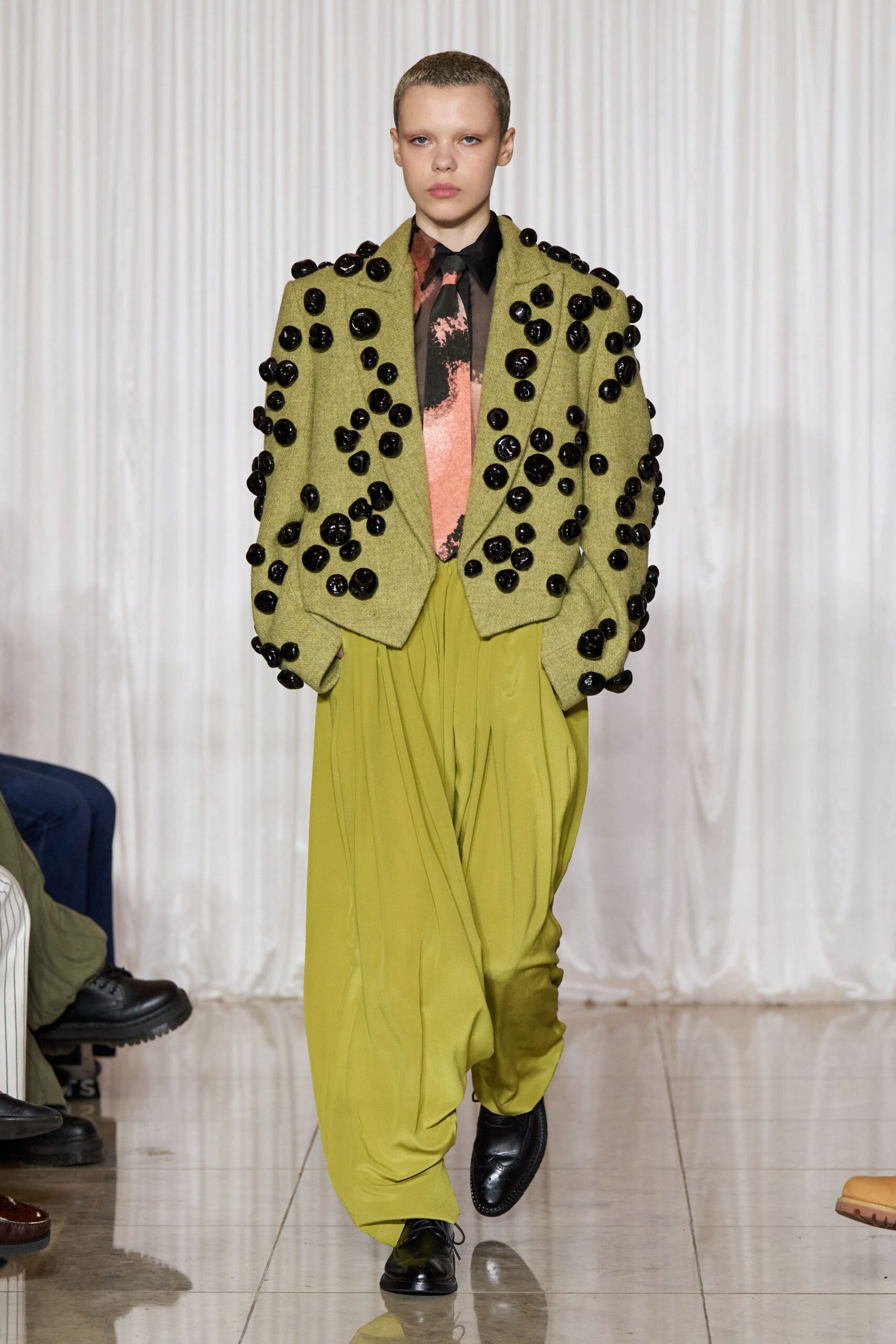 green embellished blazer with yellow pants