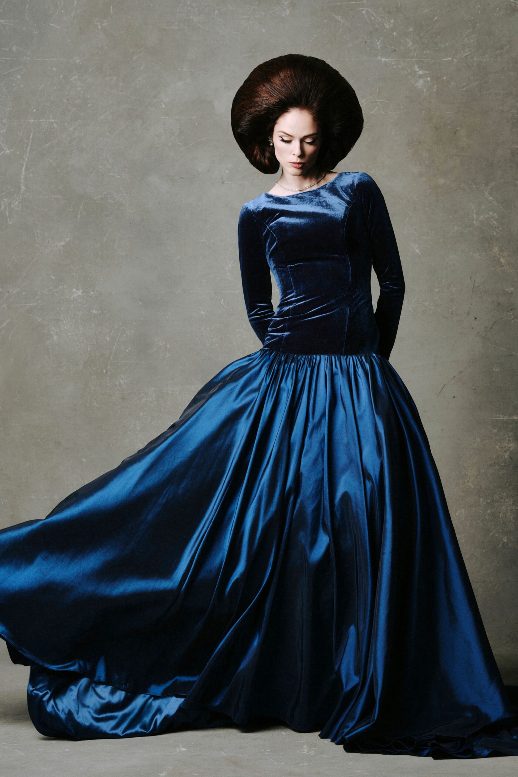 blue velvet long-sleeve gown