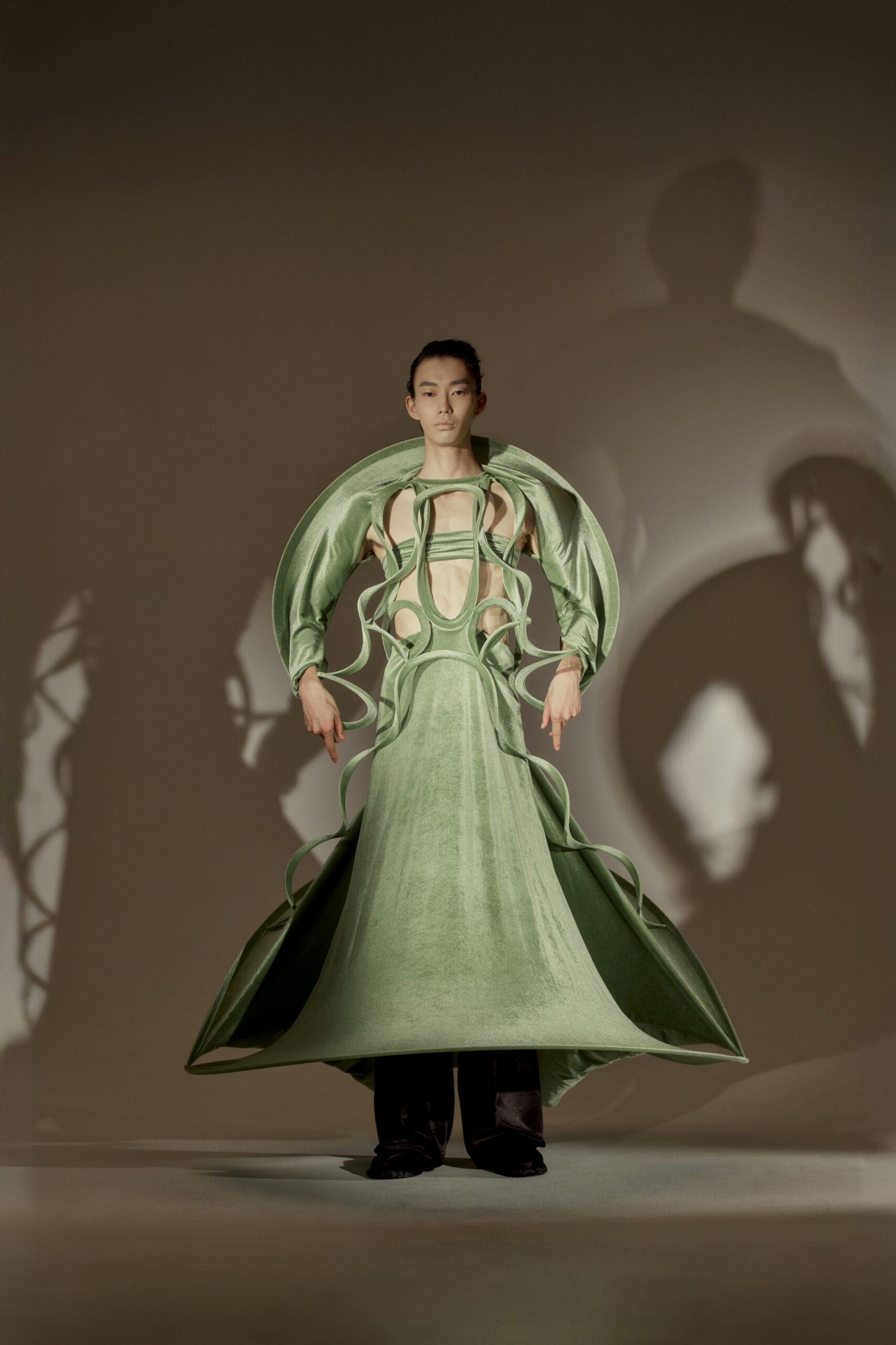 green velvet gown with black pants