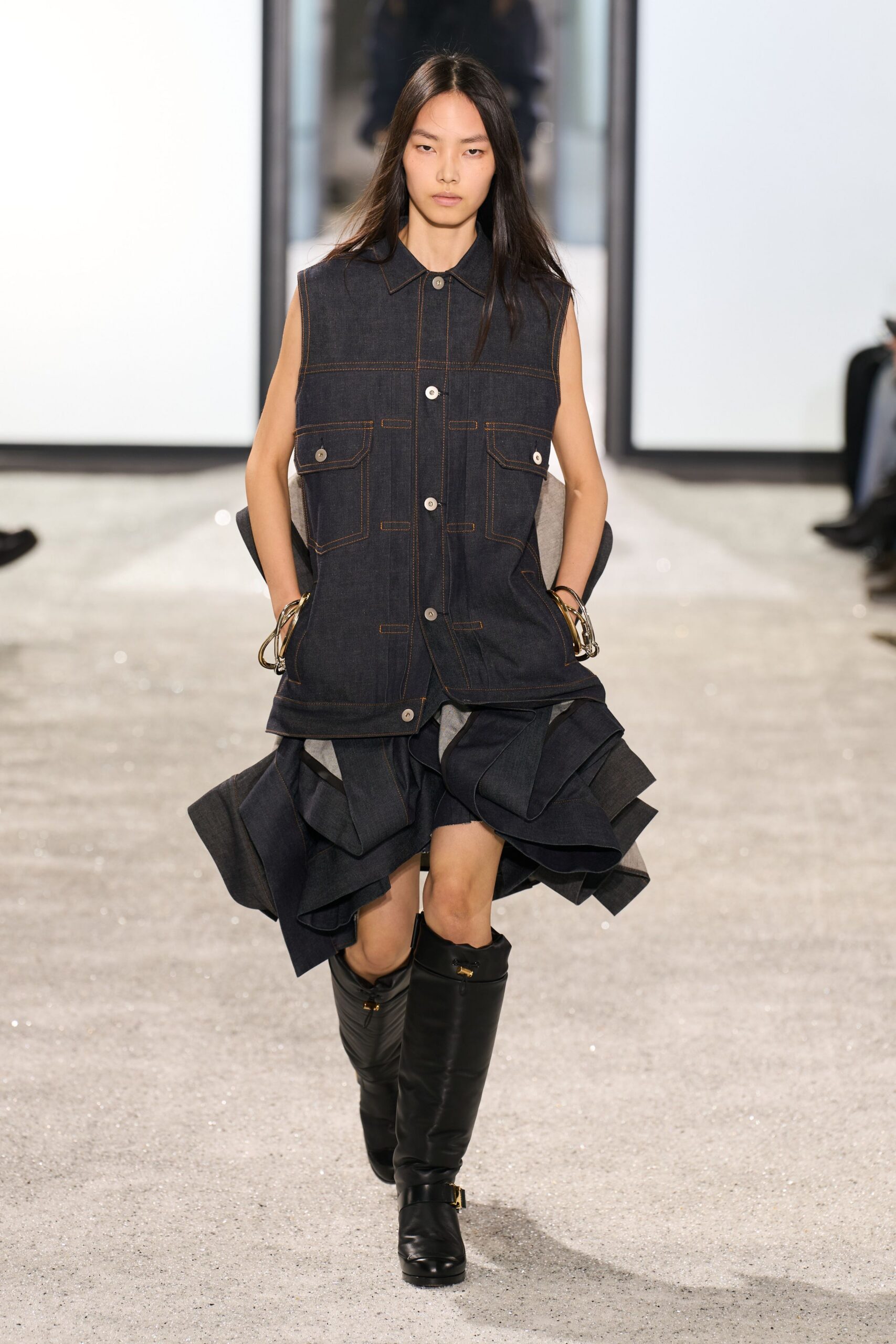 blue denim vest and skirt with black boots