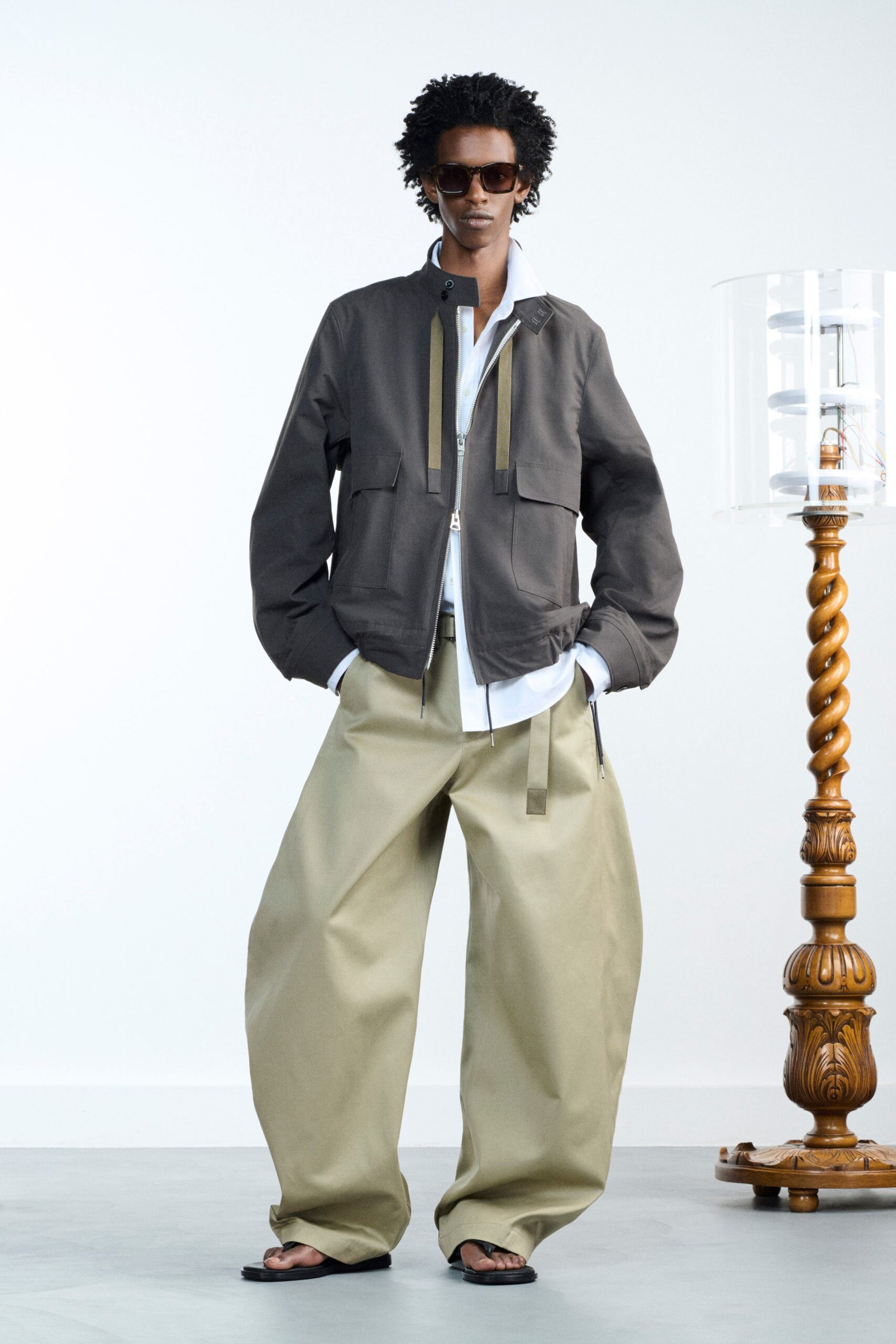 gray relaxed jacket with beige pants
