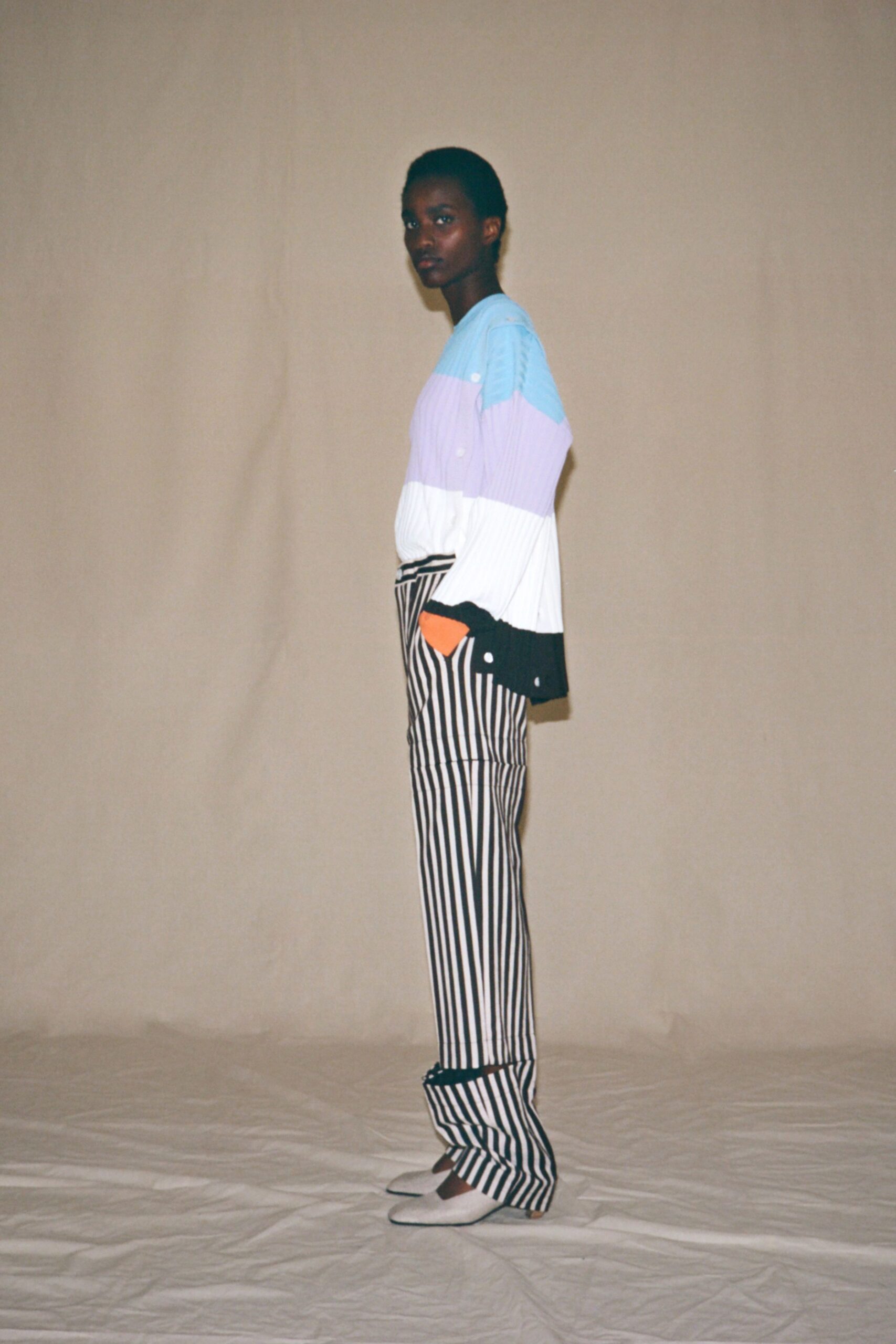 color-blocked top with striped pants