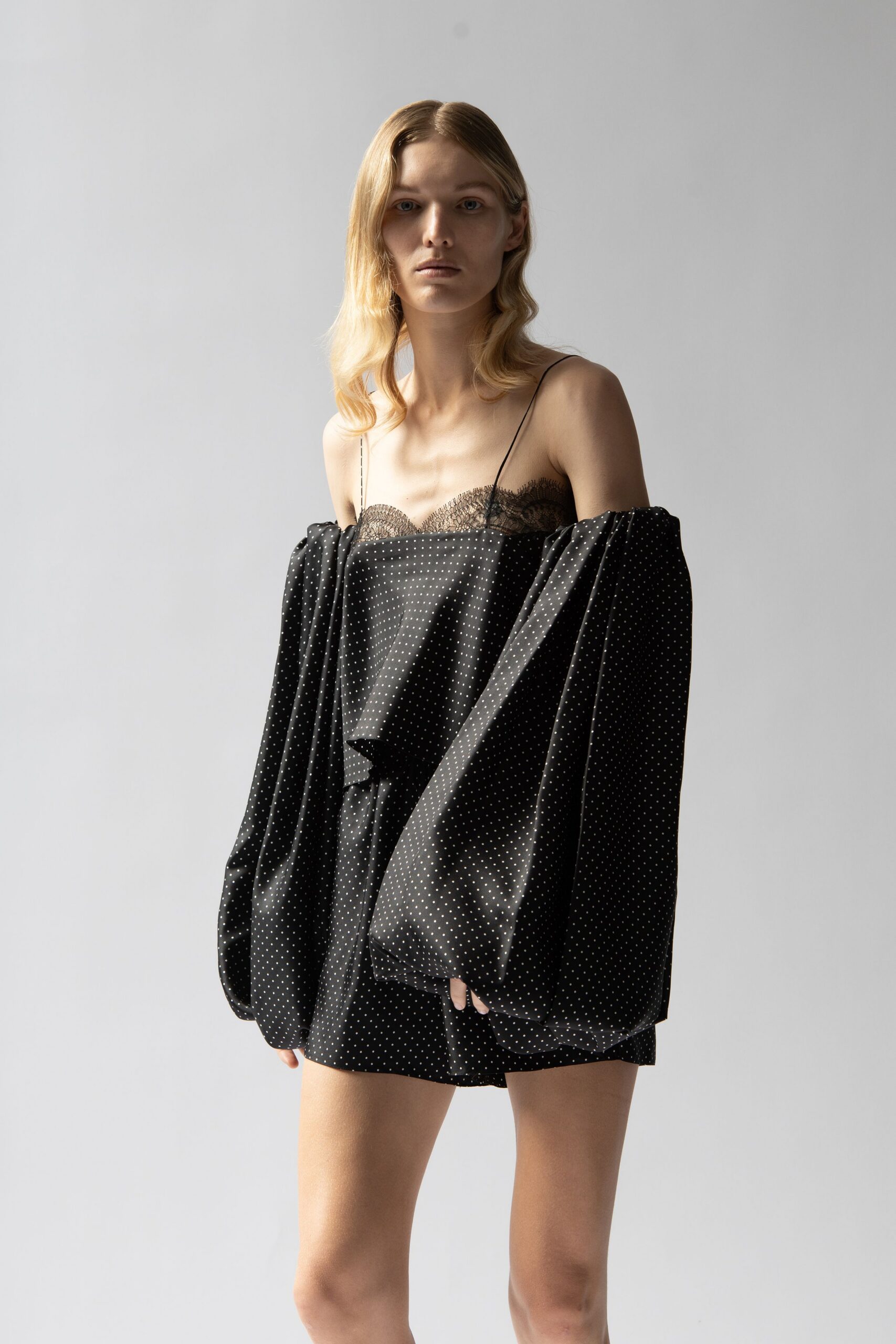 black silk off-shoulder long-sleeve relaxed polka-dot pleated top