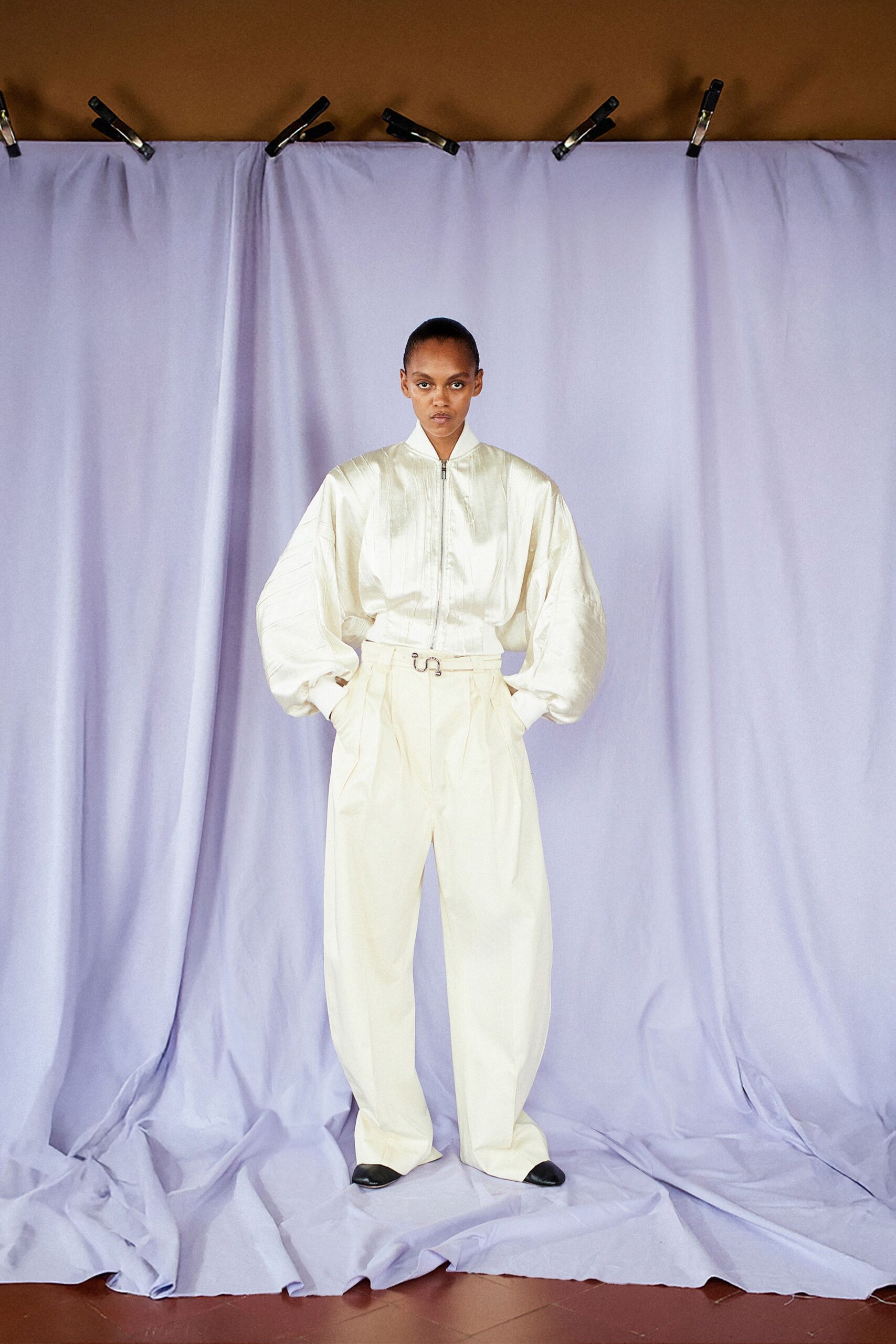 white silk relaxed shirt with beige pants