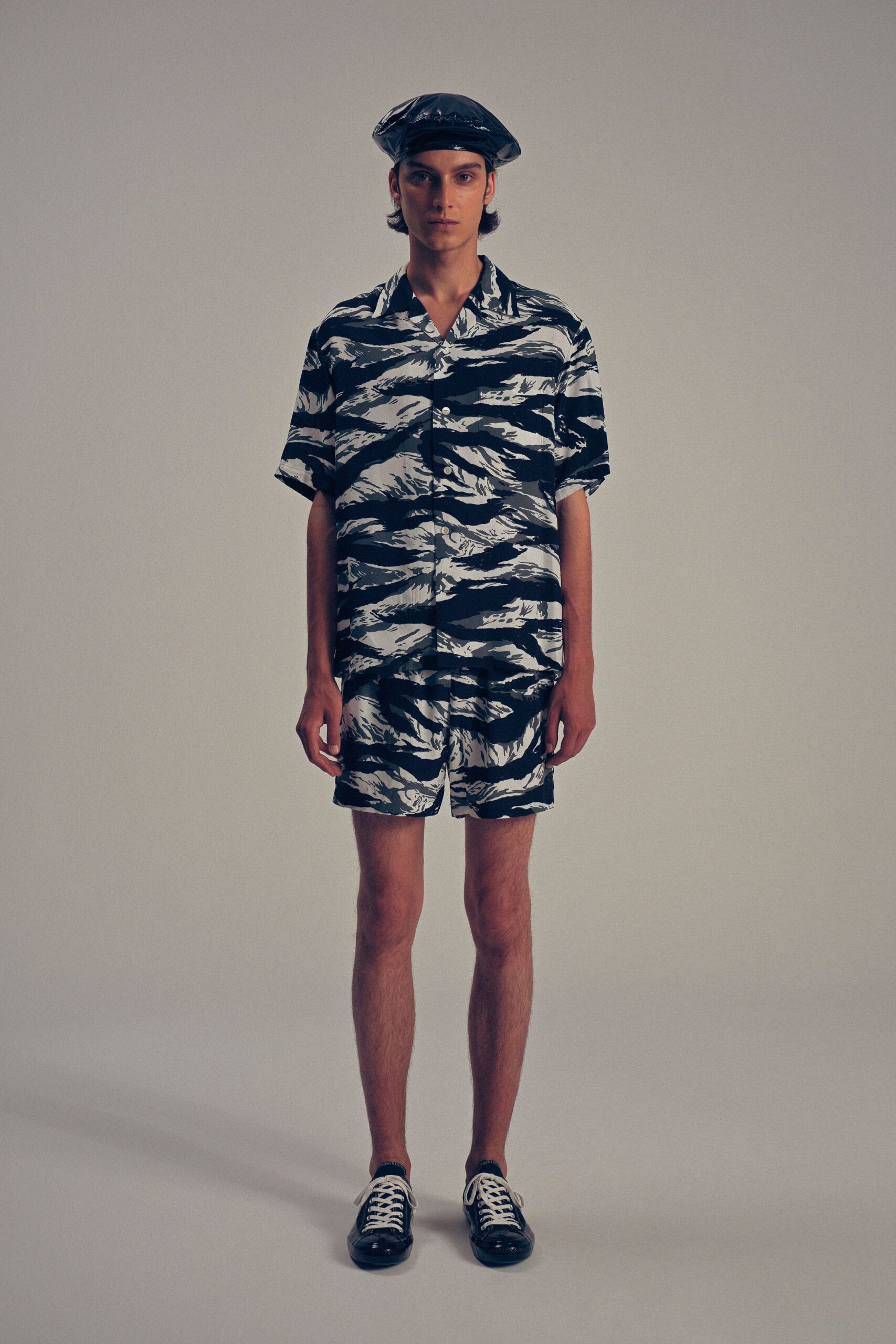 black and white printed shirt and shorts