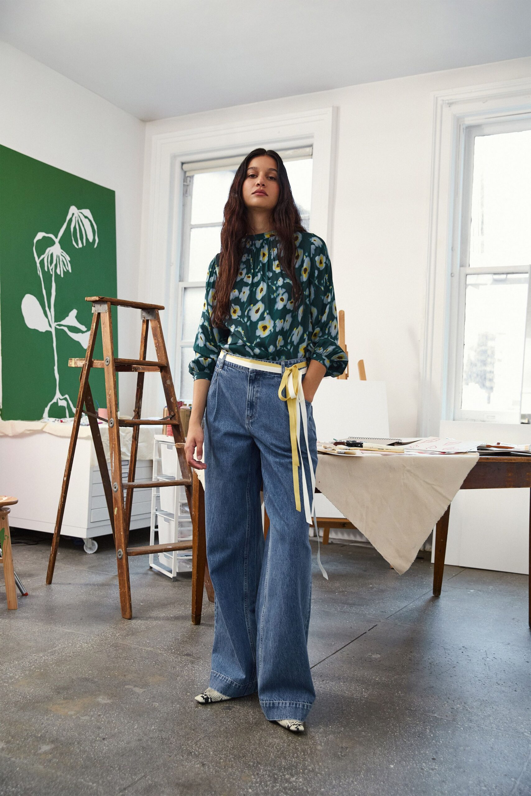 floral green top with wide-leg jeans
