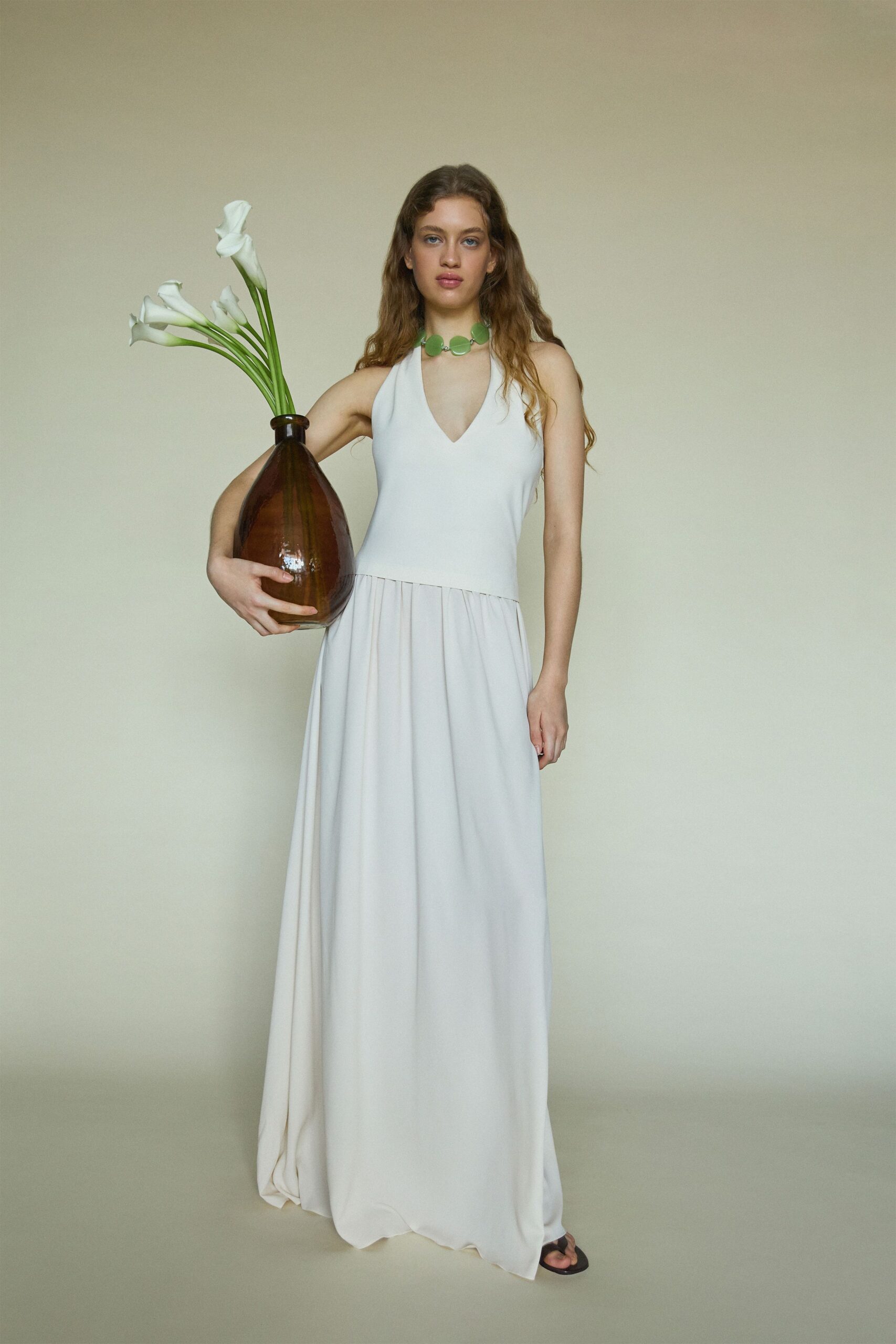 white silk sleeveless gown