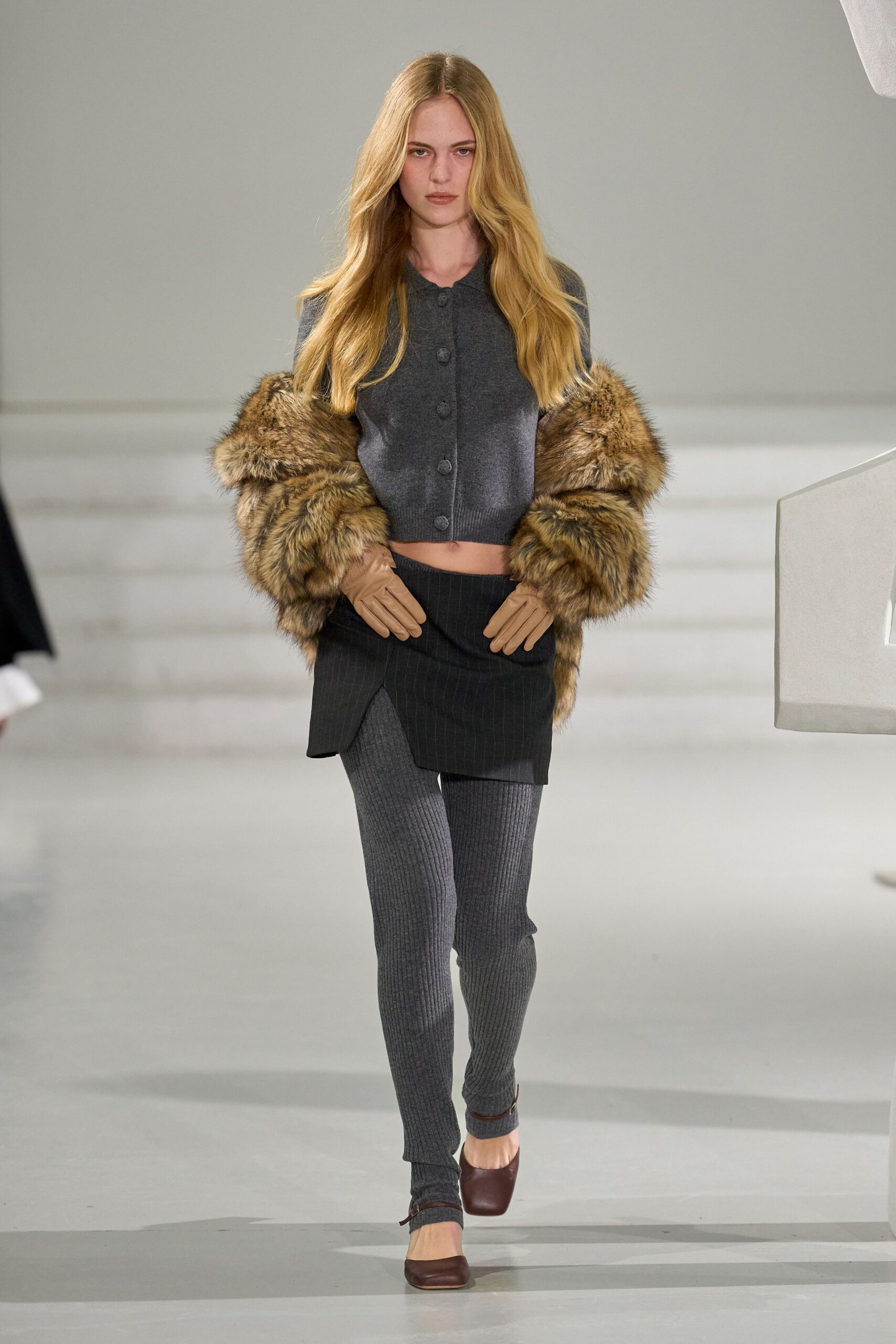 gray top with faux-fur coat