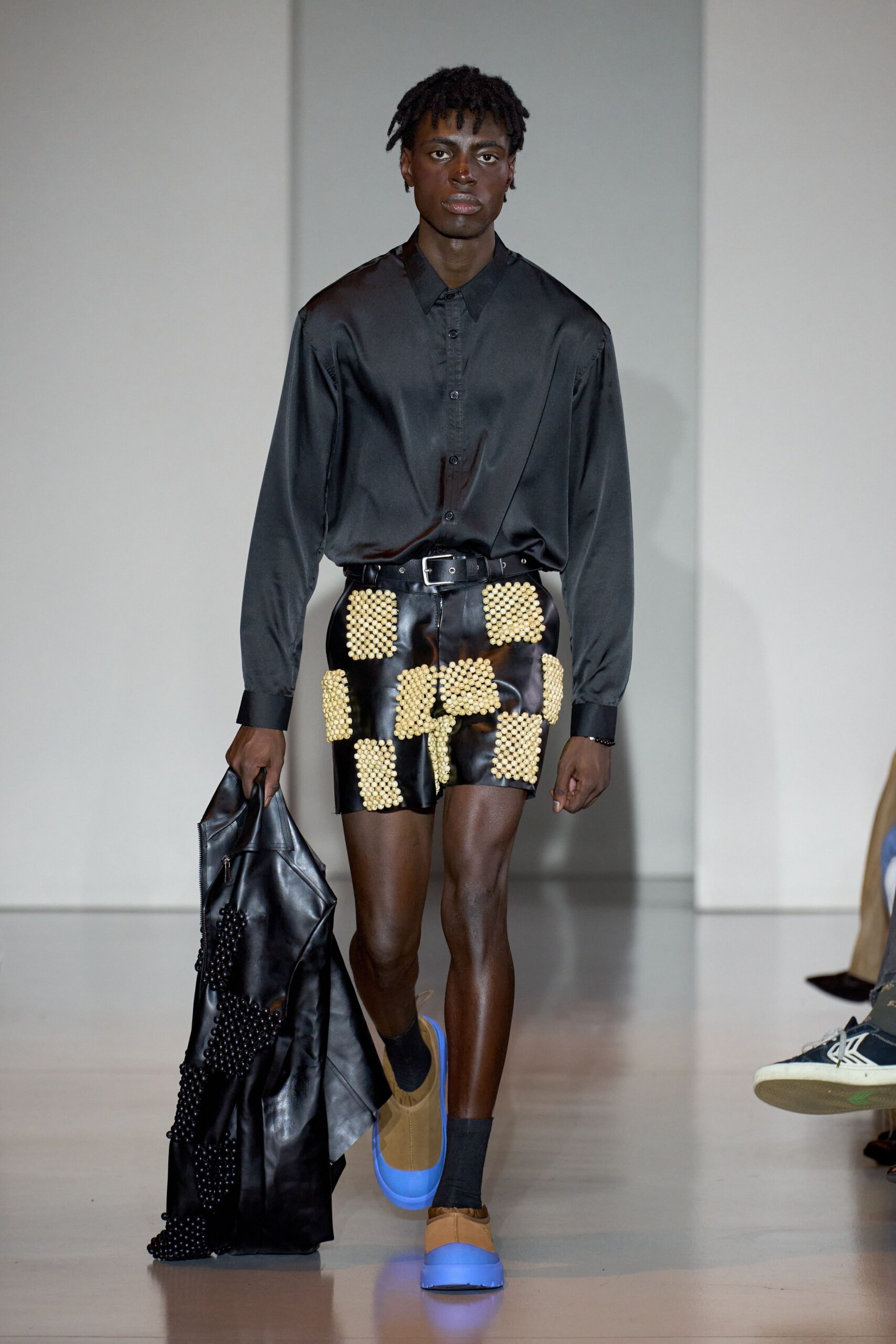 black silk shirt with checkered shorts