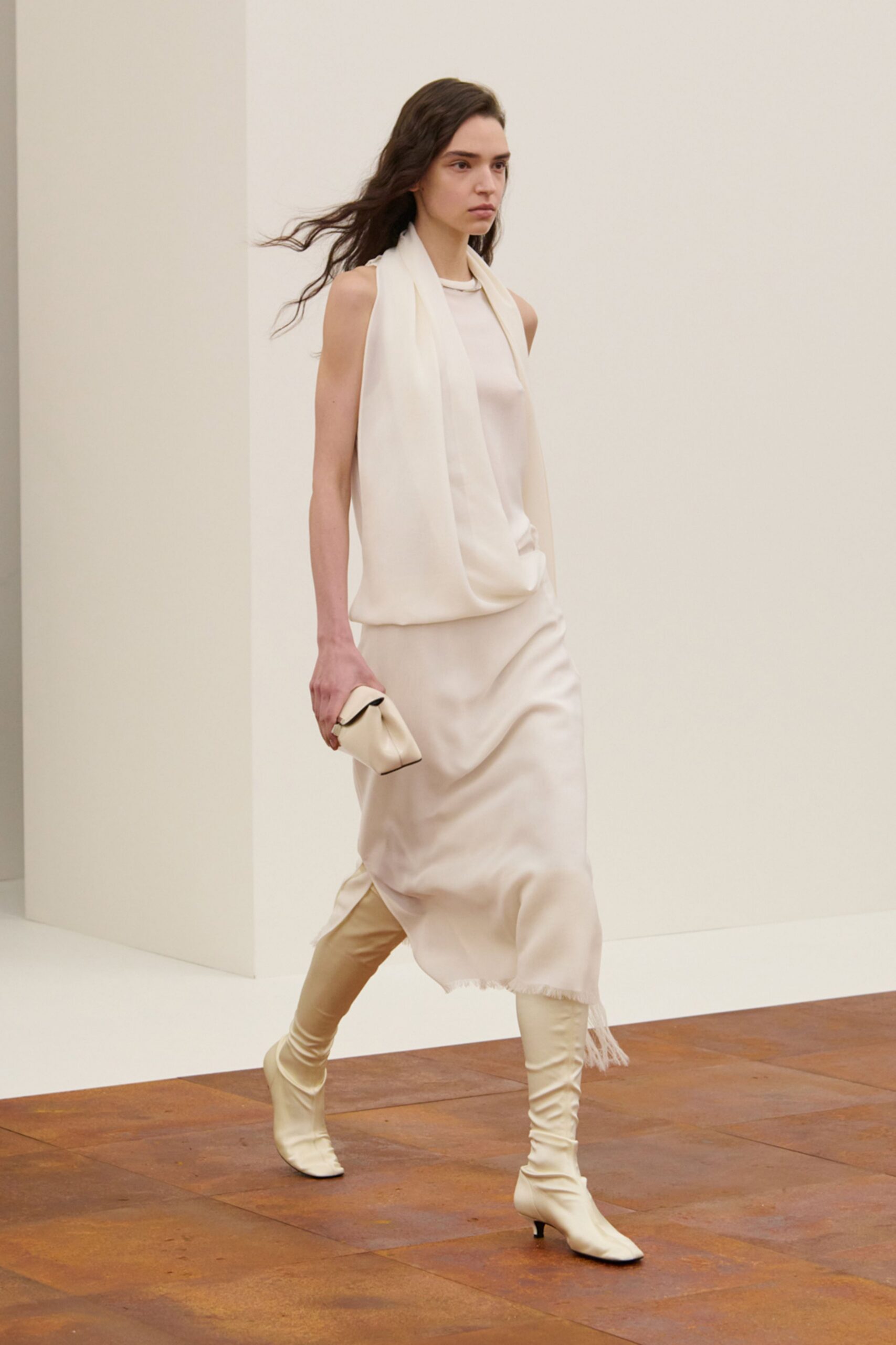 white silk sleeveless high-neck fitted layered flowing dress