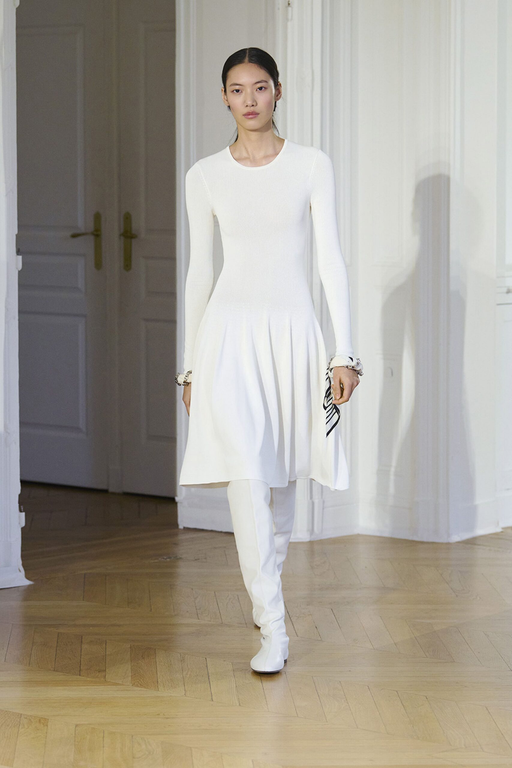 white fitted midi dress with boots