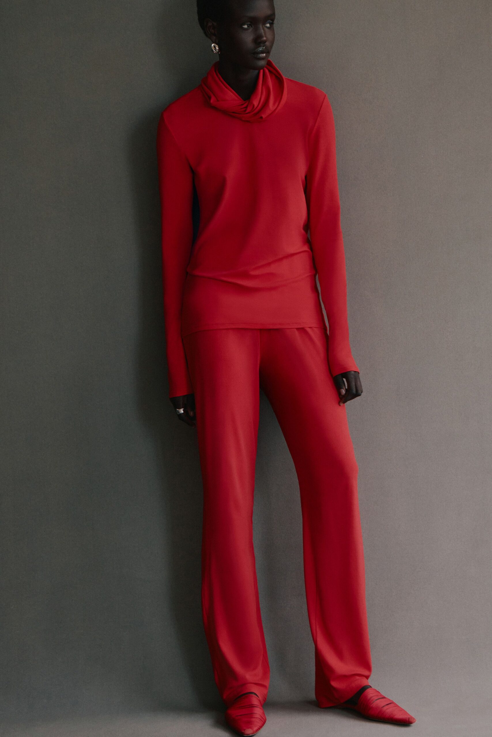 red jersey fitted flared pants