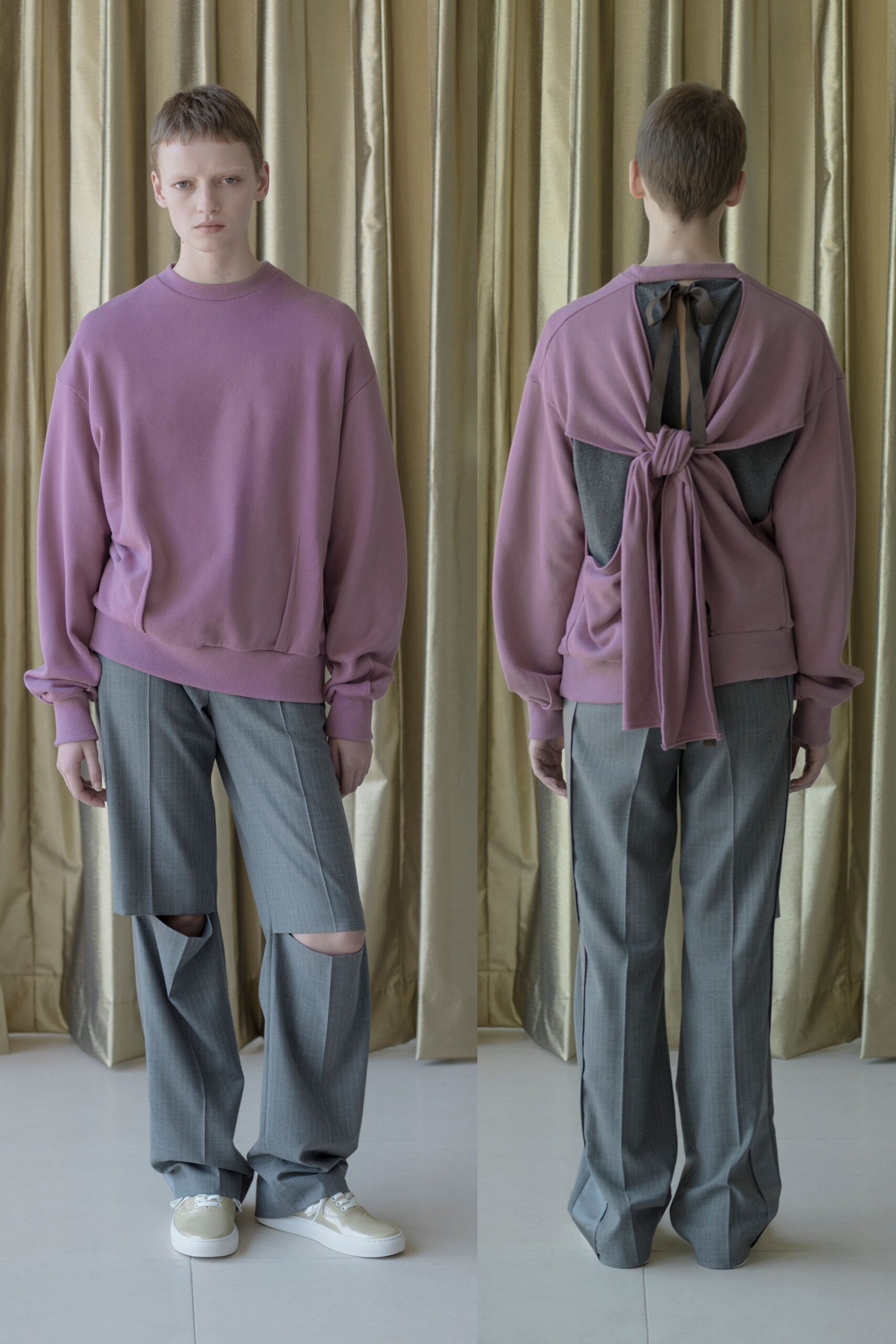 pink relaxed sweater with gray pants