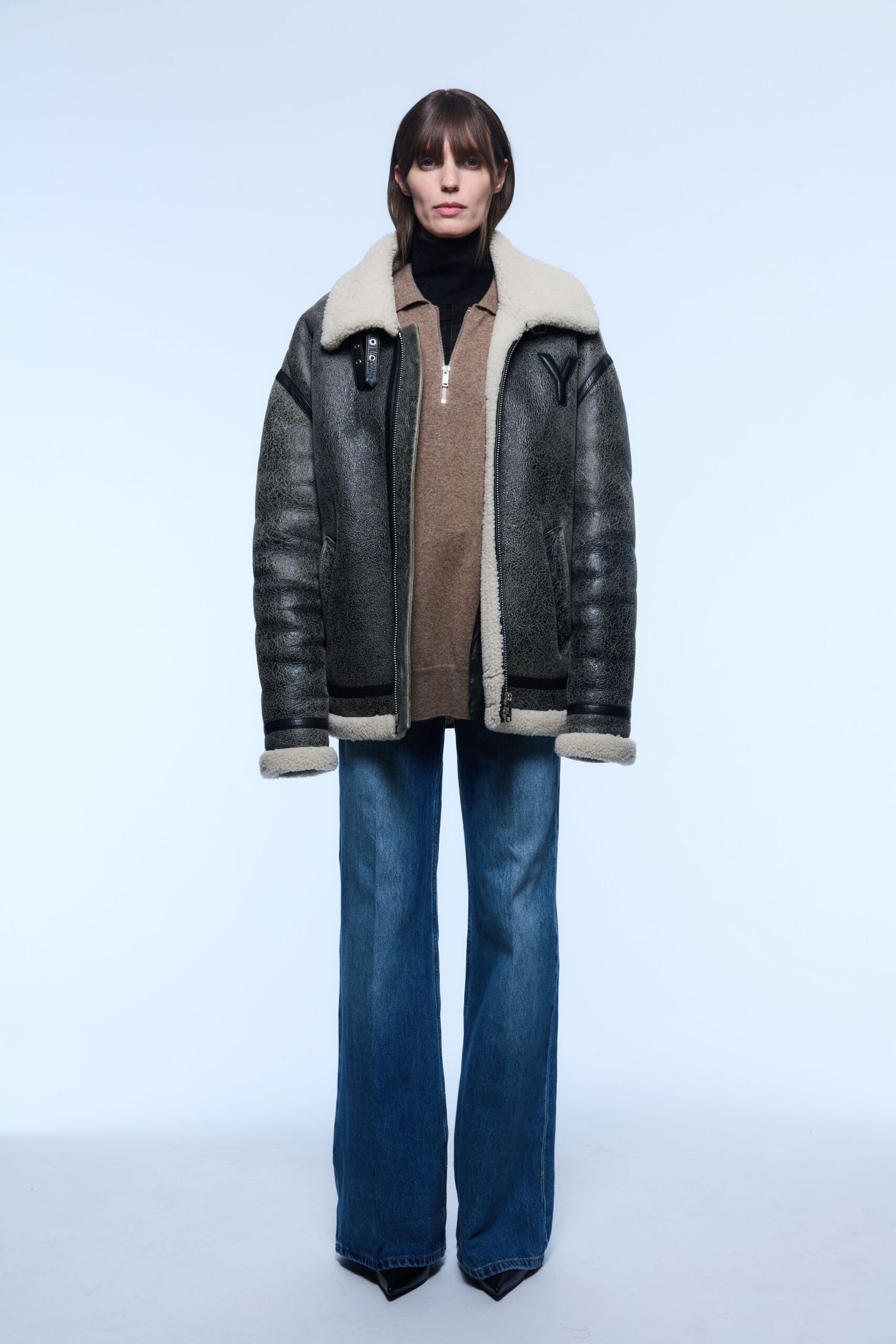 black leather long-sleeve collared oversized zippered jacket