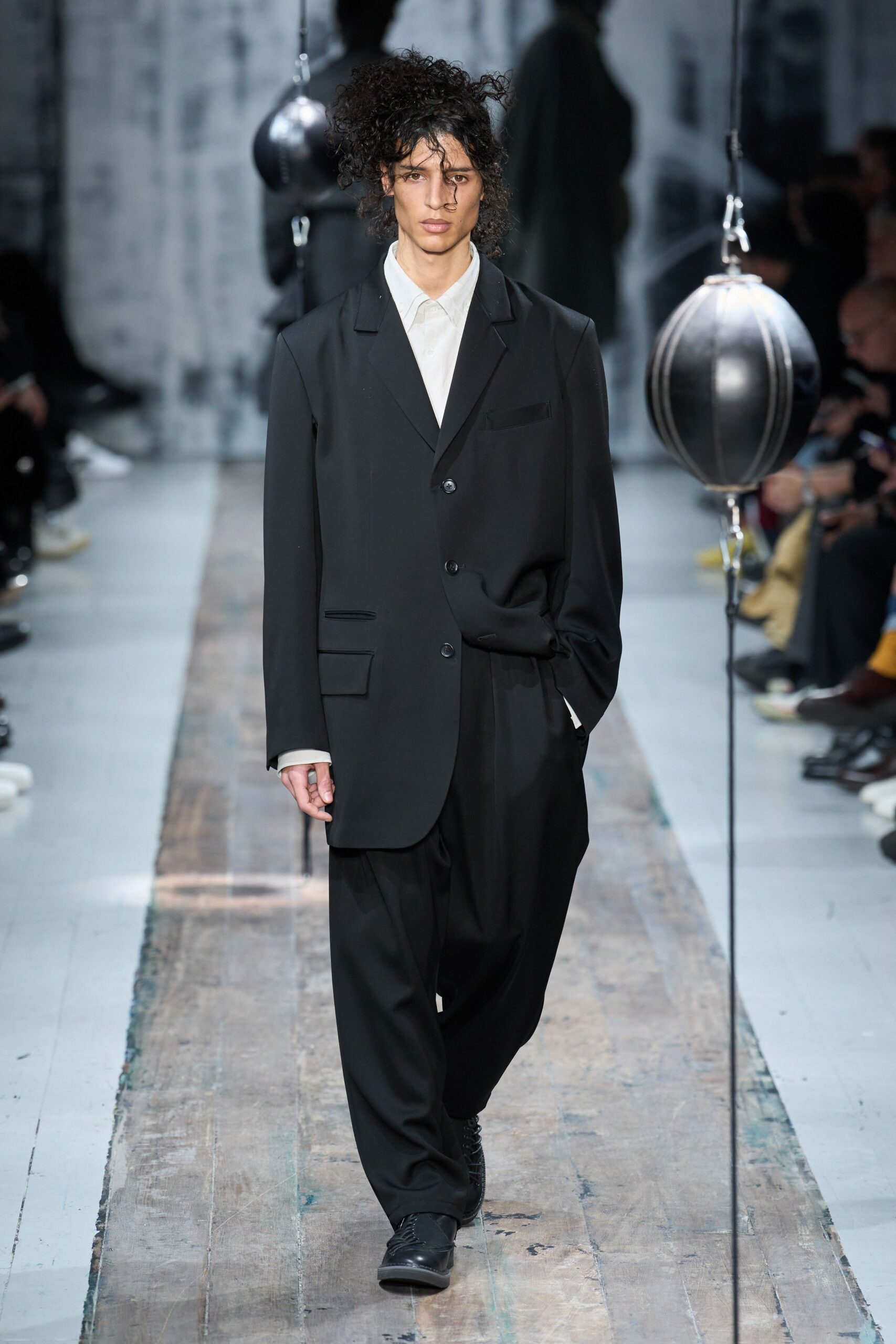 black relaxed suit with white shirt