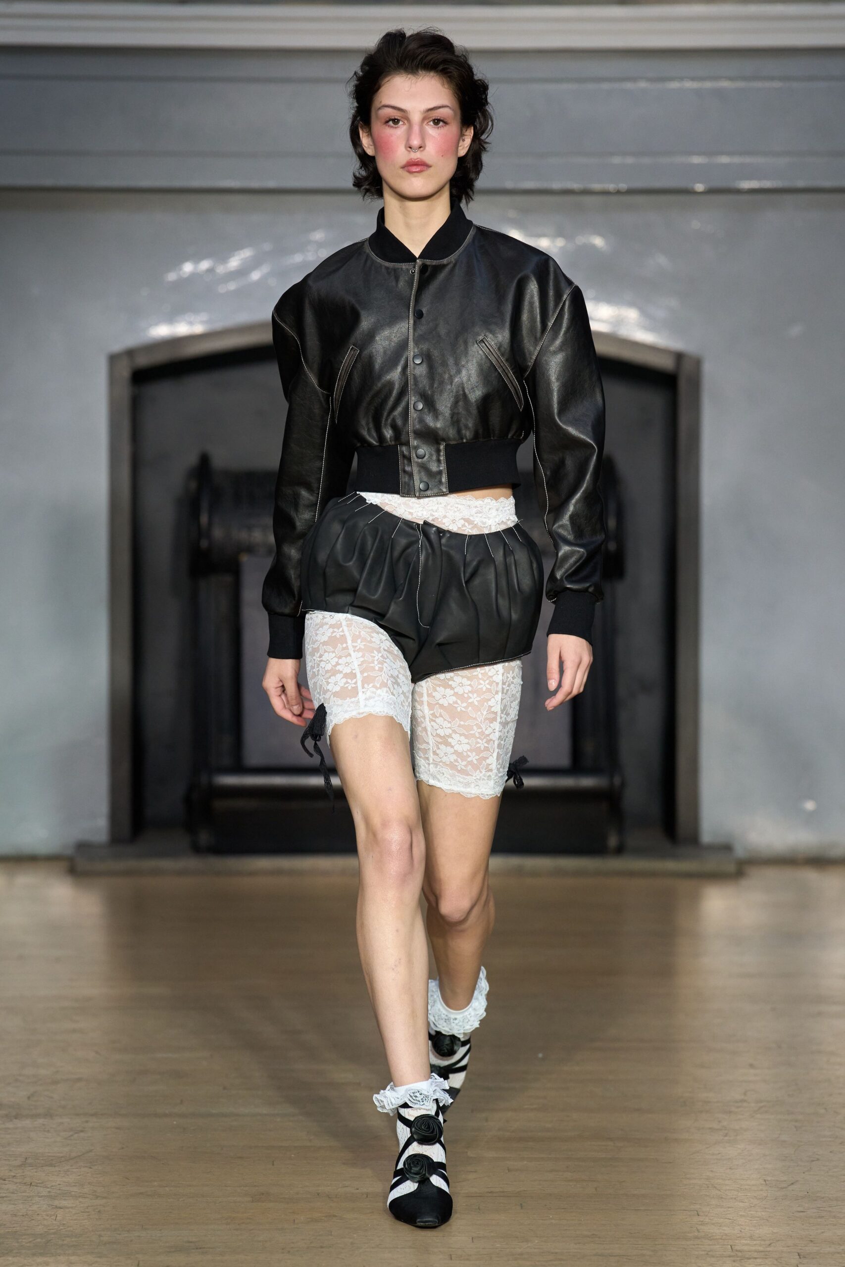 black leather jacket and shorts
