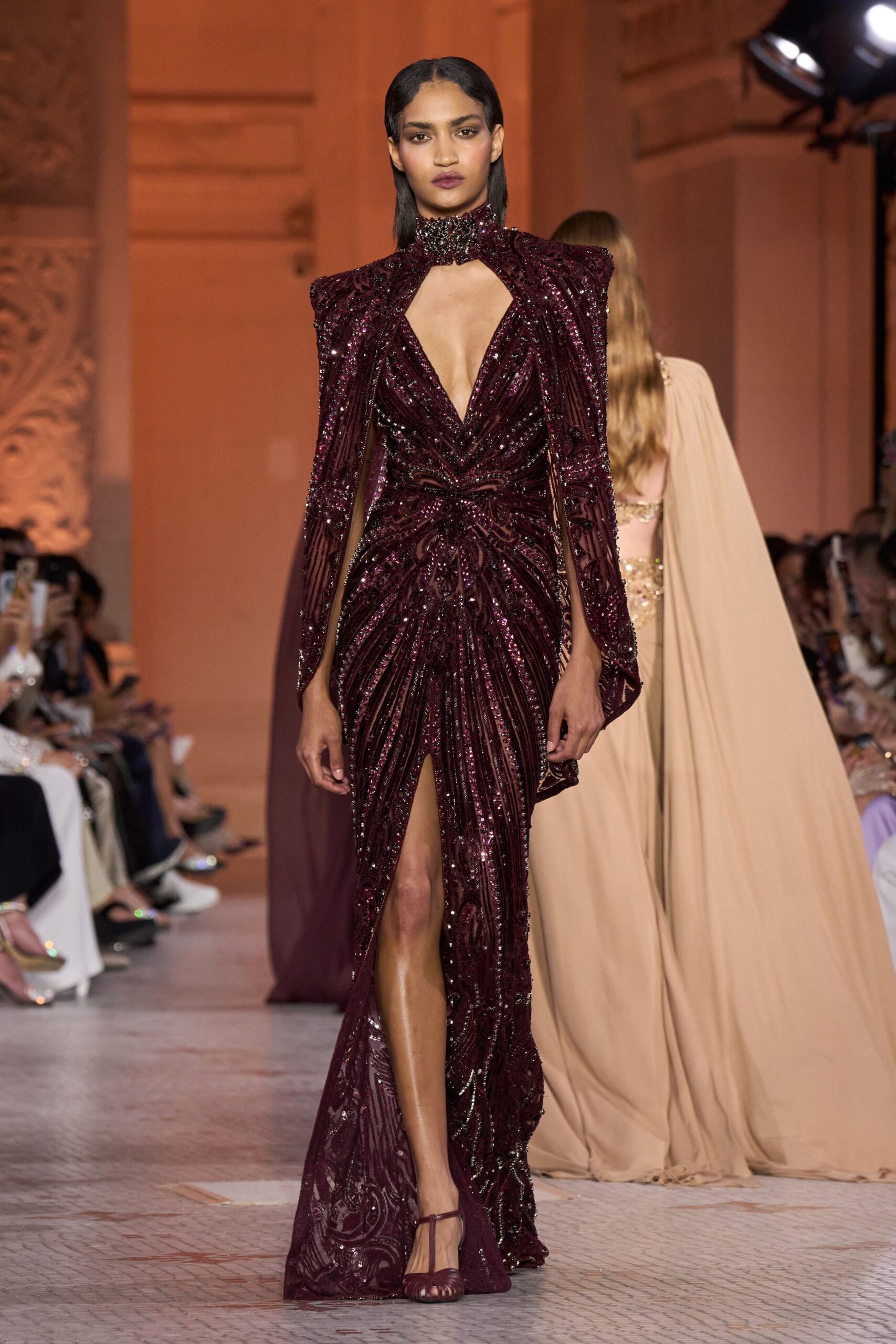 maroon sequined long-sleeve gown