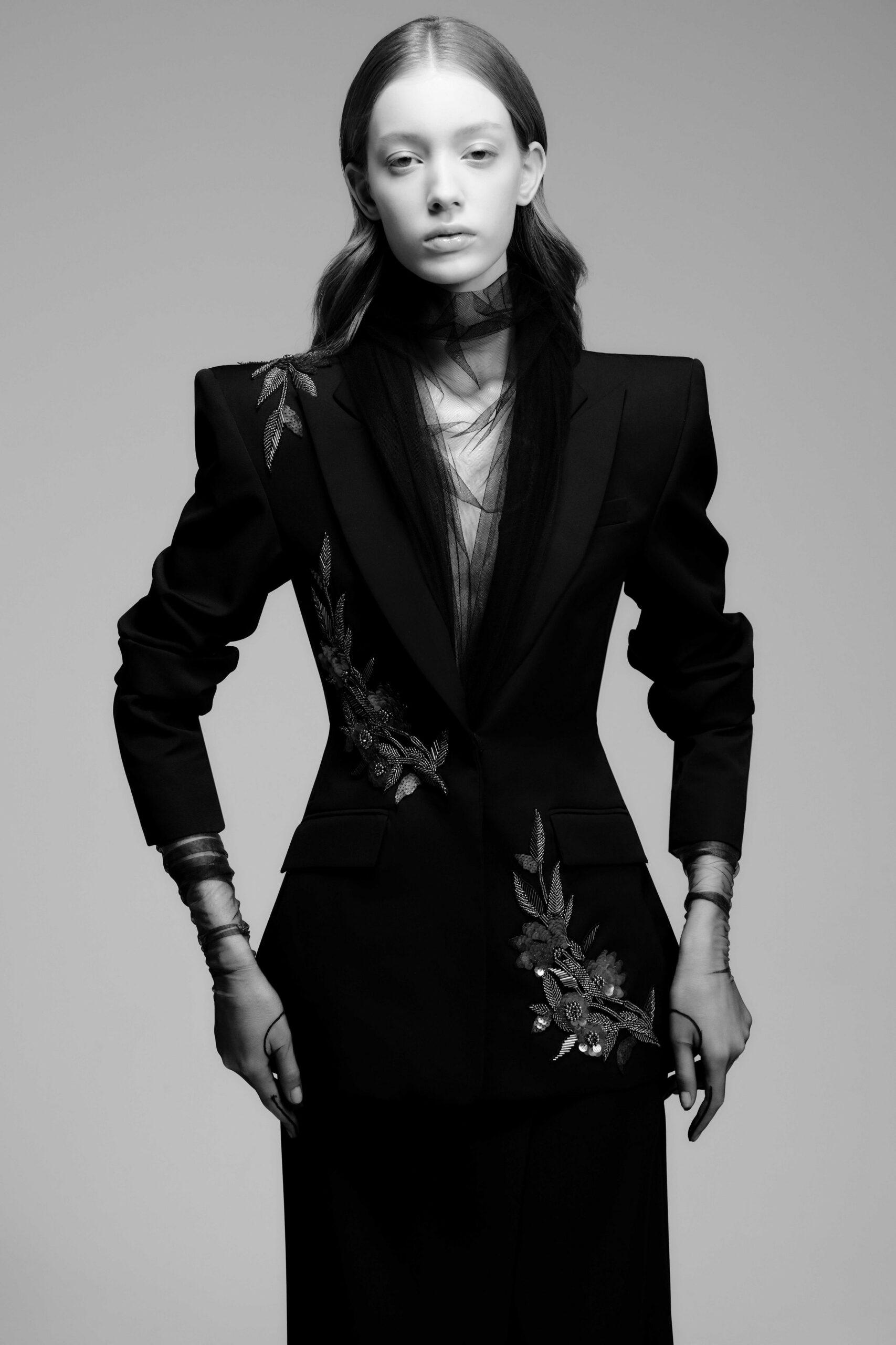 black structured blazer with sheer top
