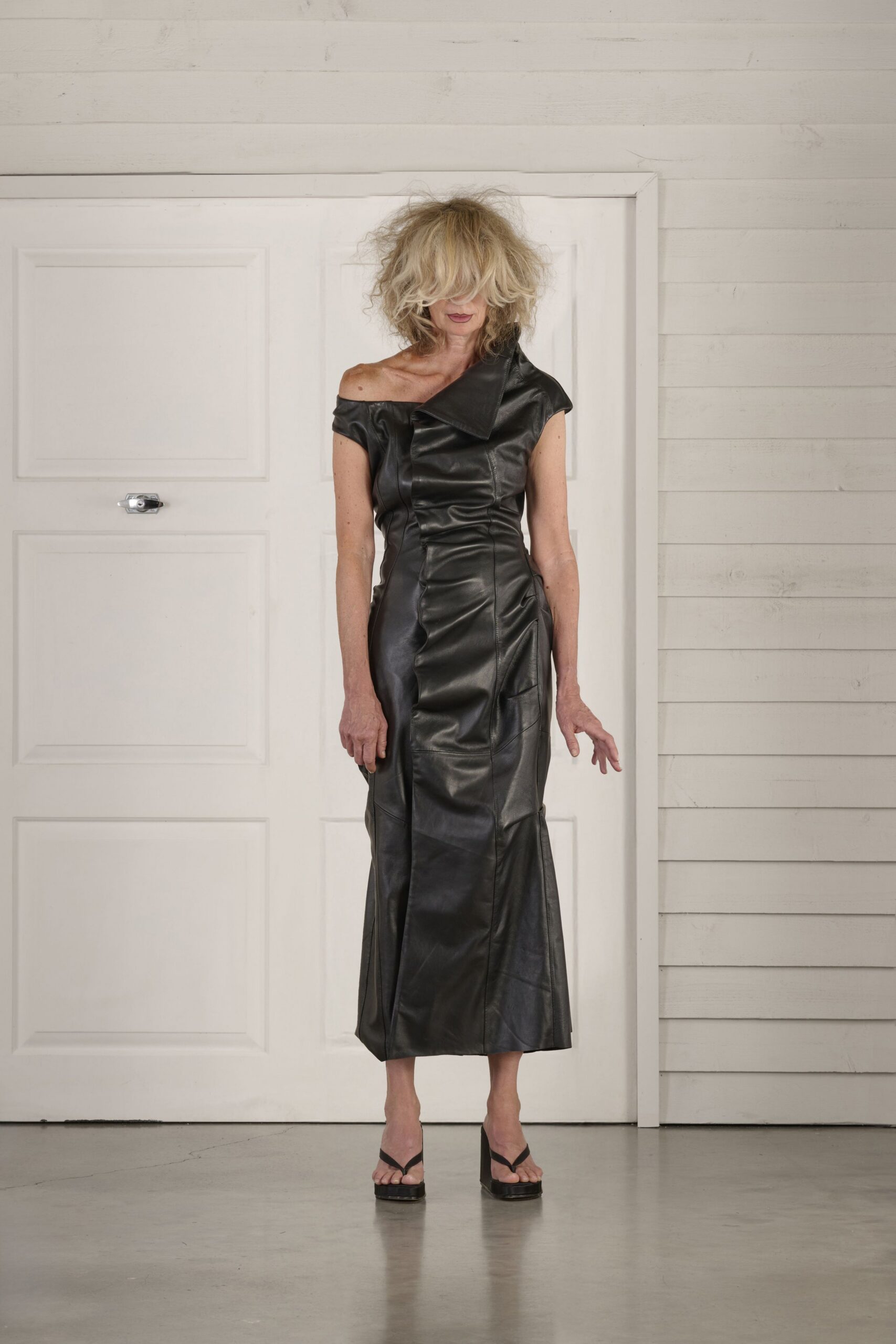 black leather off-shoulder slit fitted draped midi dress
