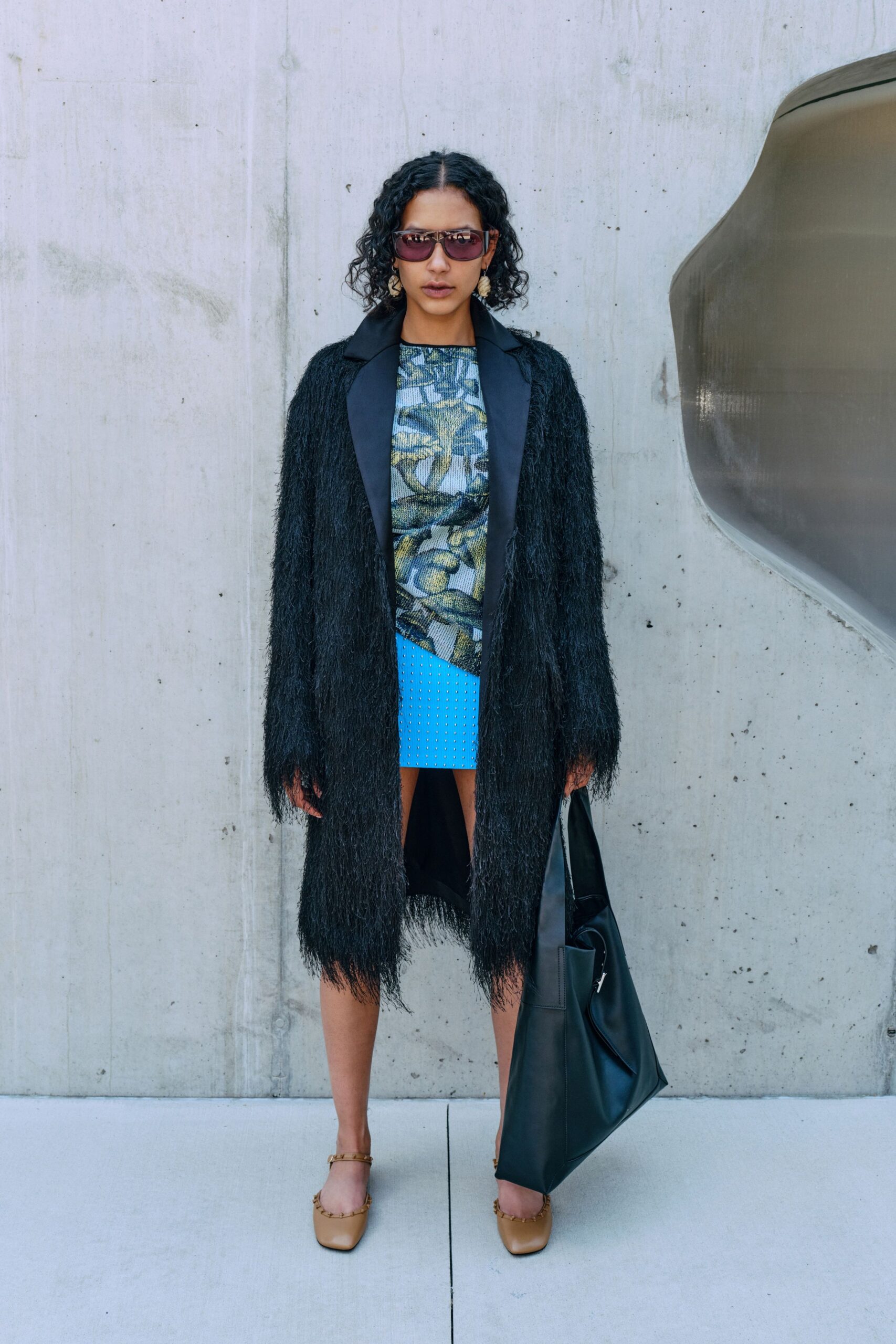 black fur coat with blue outfit
