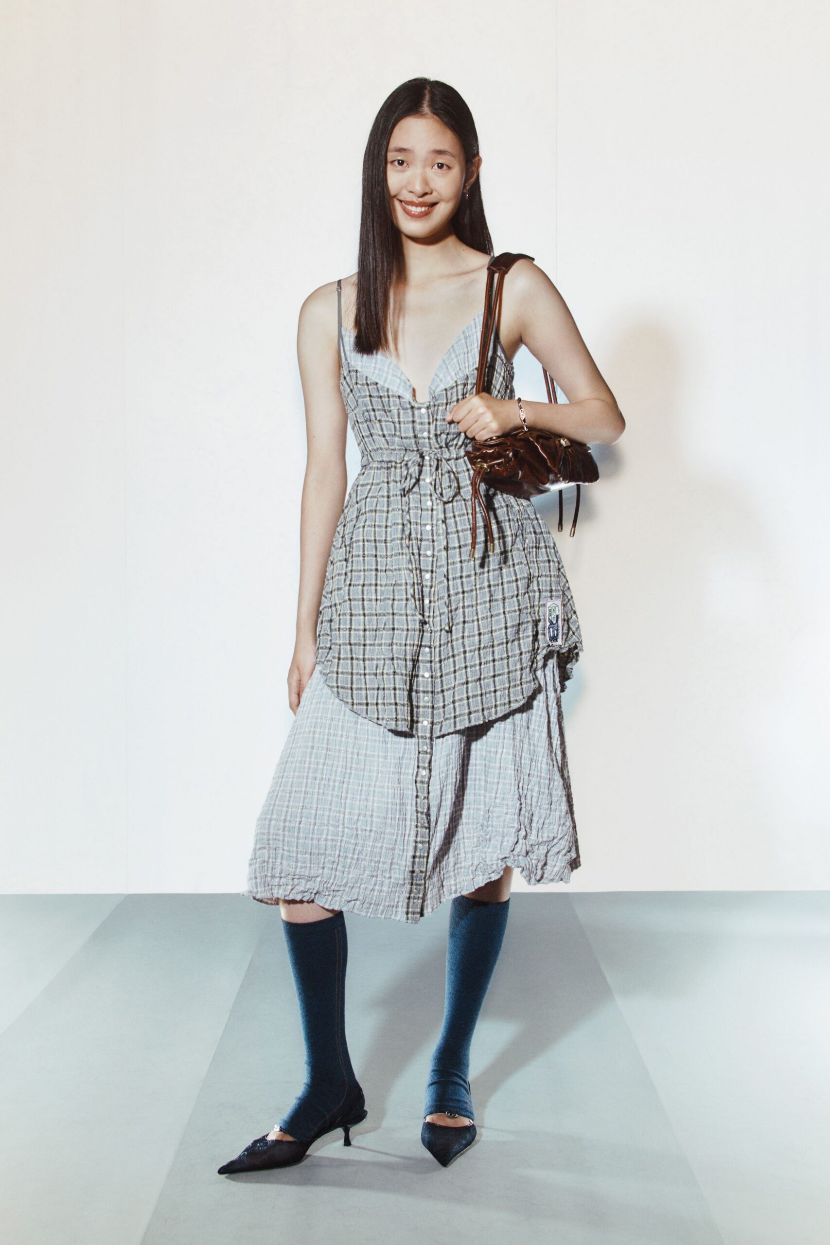 gray checked midi dress with bag