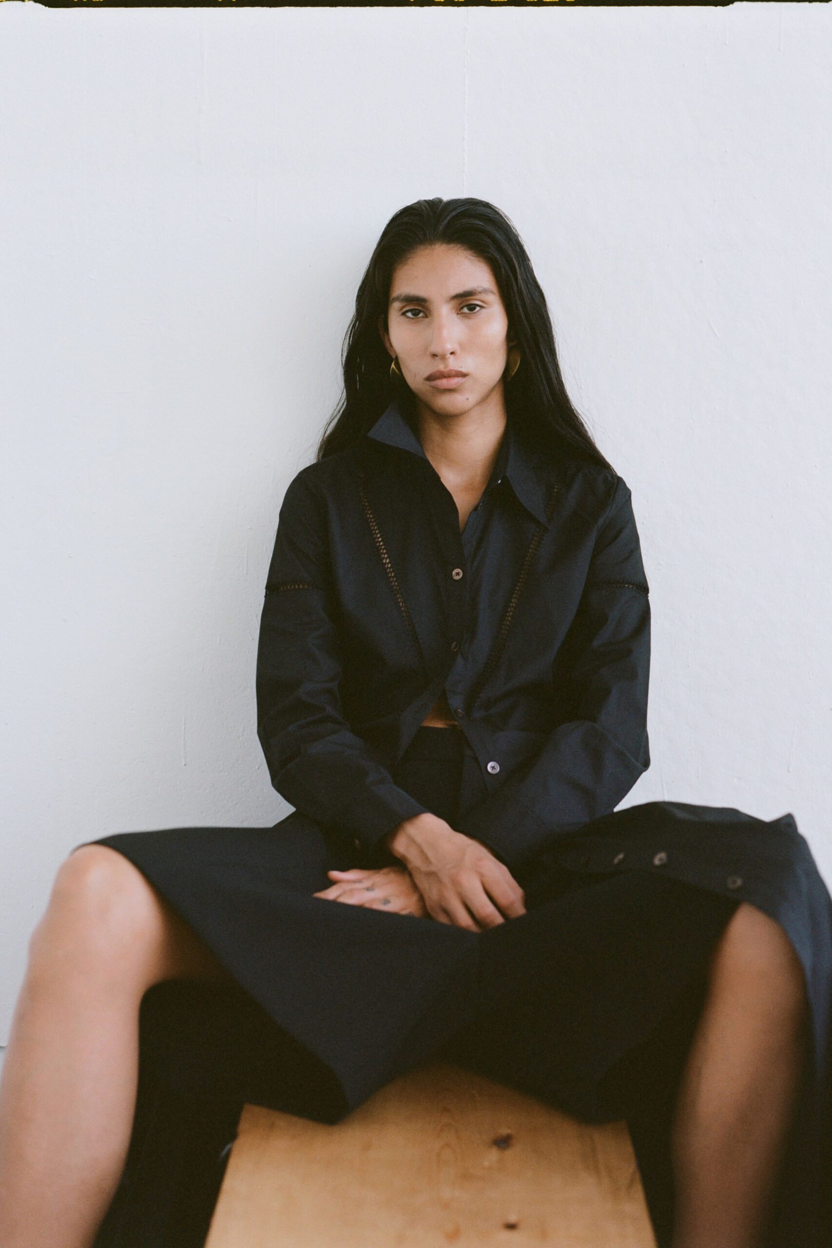 black fitted shirt and skirt
