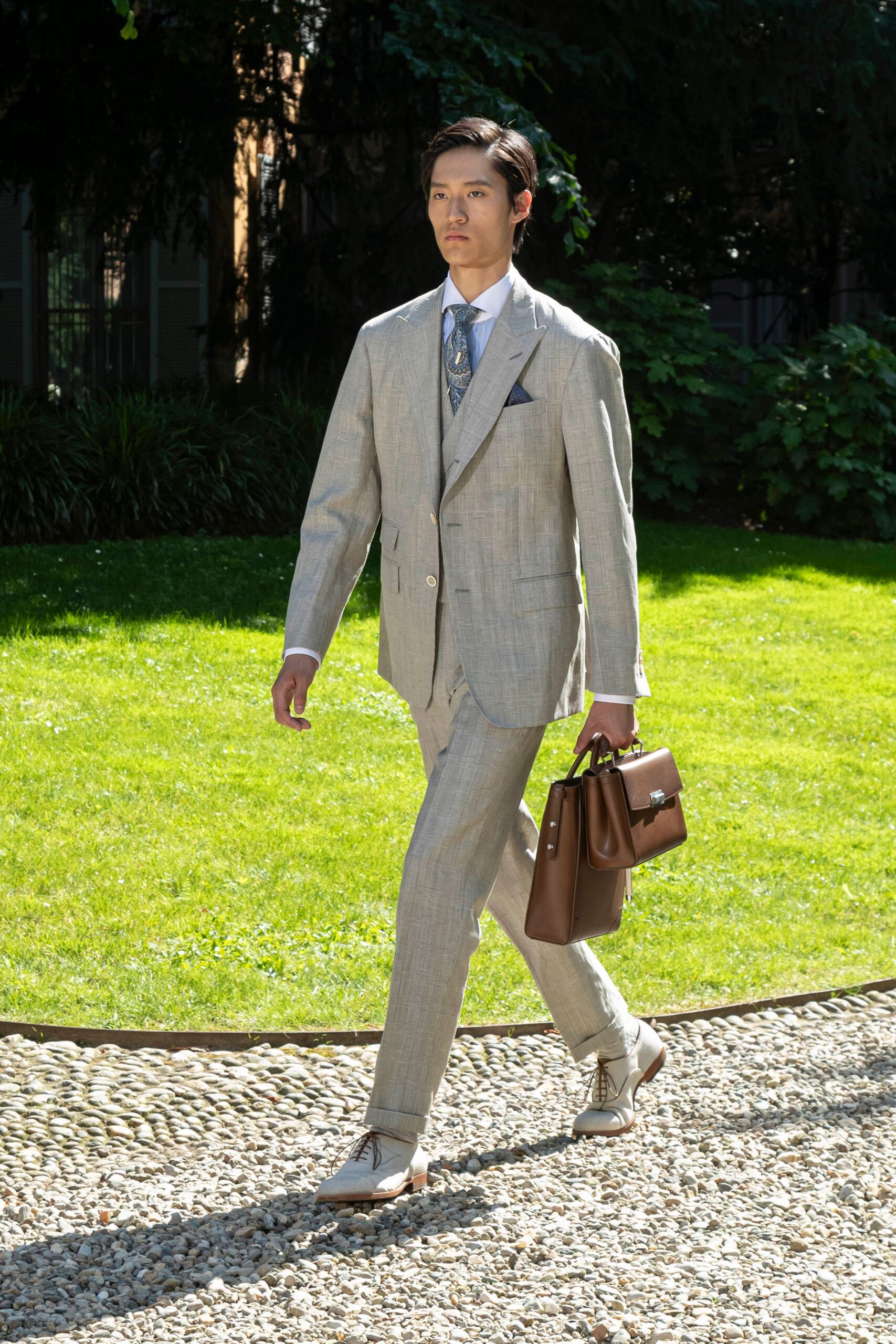 beige tailored suit with white shirt