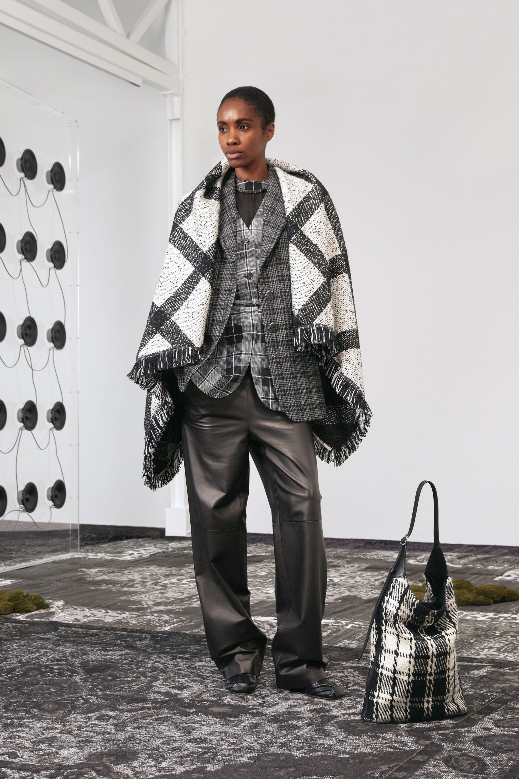 tailored gray blazer with leather pants