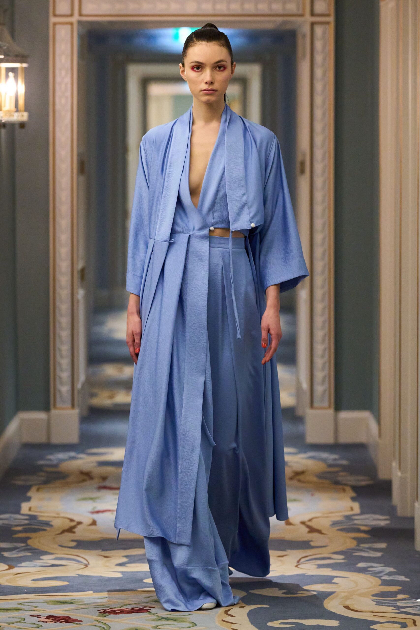 blue silk sleeveless v-neck fitted draped flowing gown