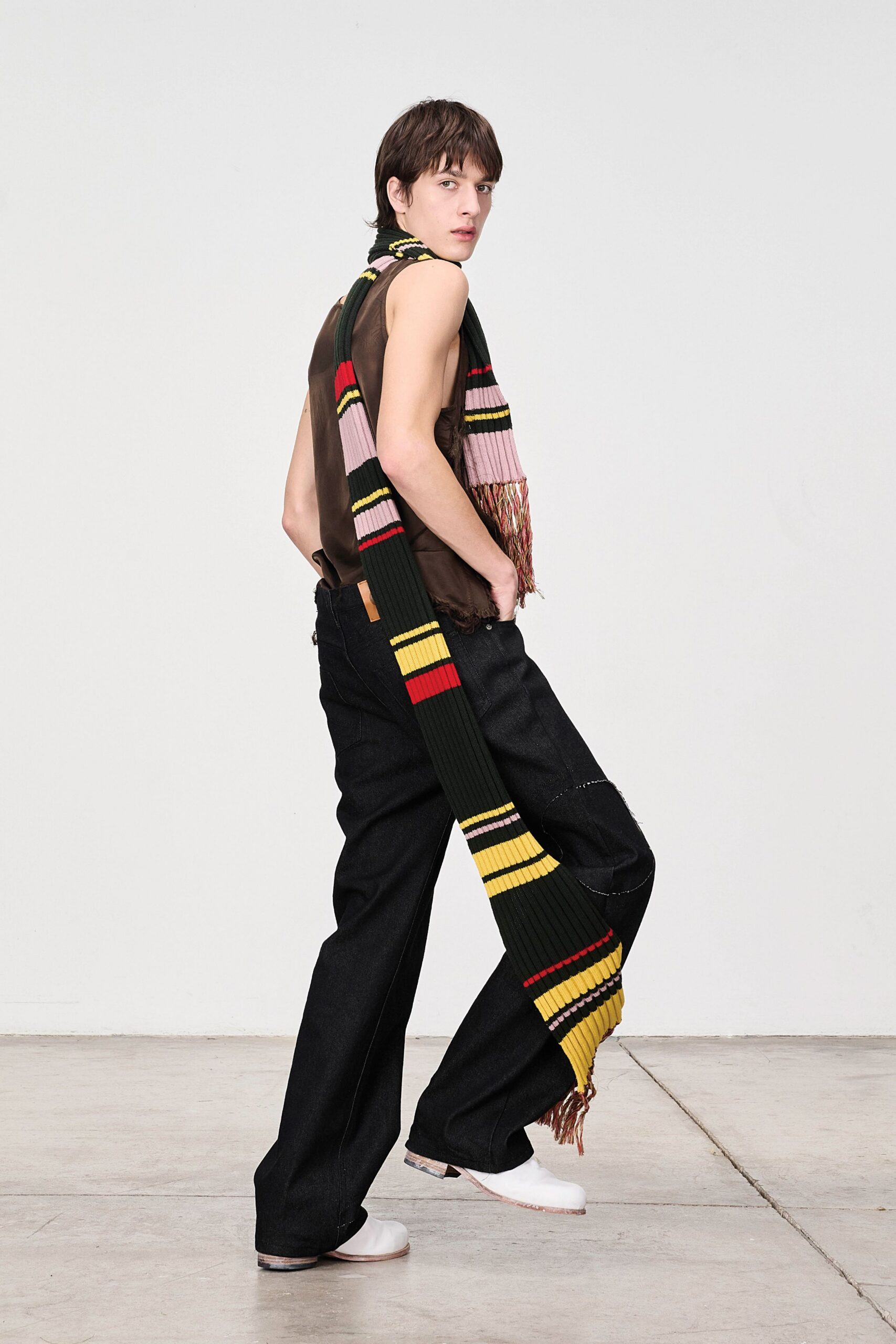 brown sleeveless top with multi scarf