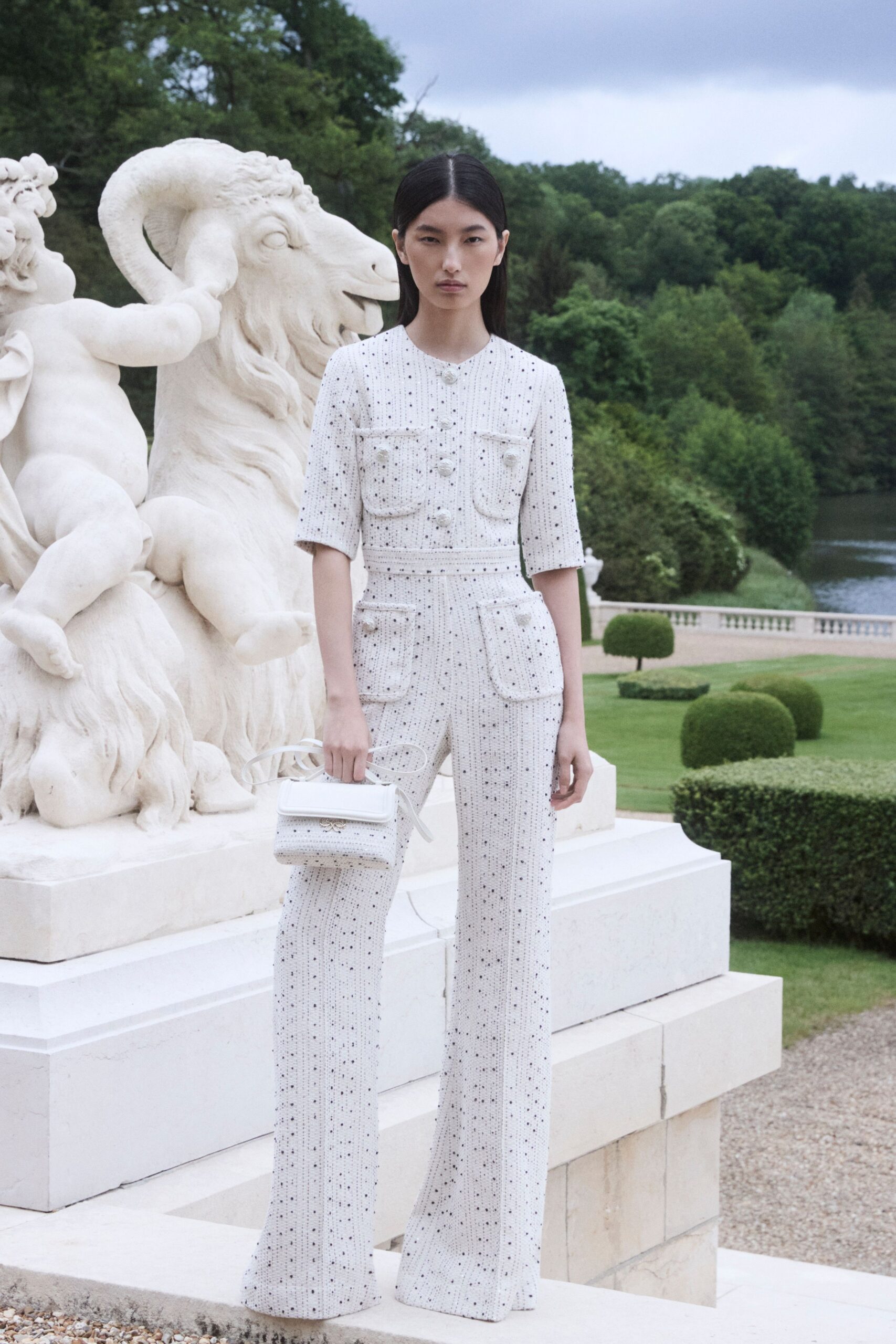 white embroidered jumpsuit with bag