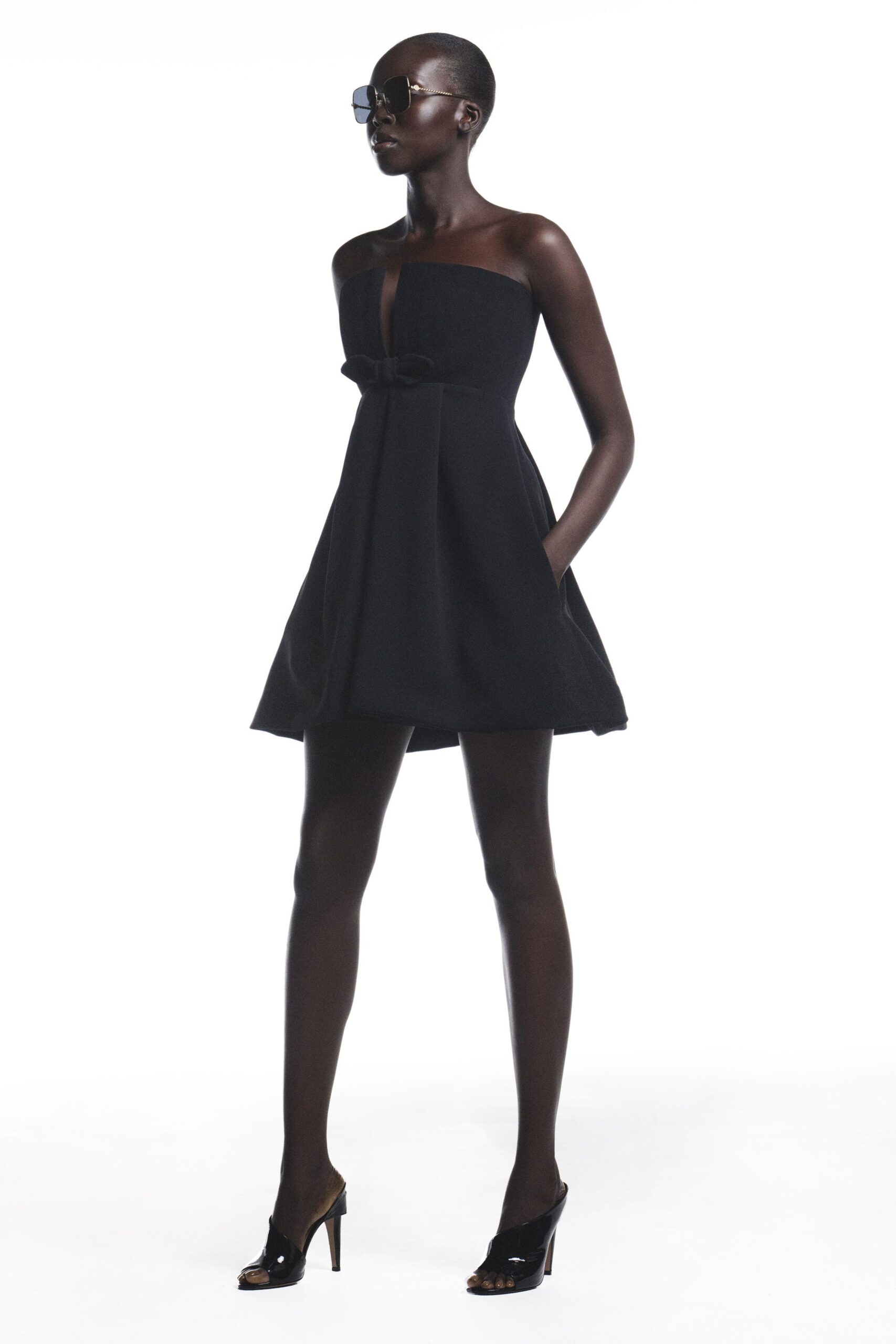 black cotton strapless v-neck fitted pleated mini dress
