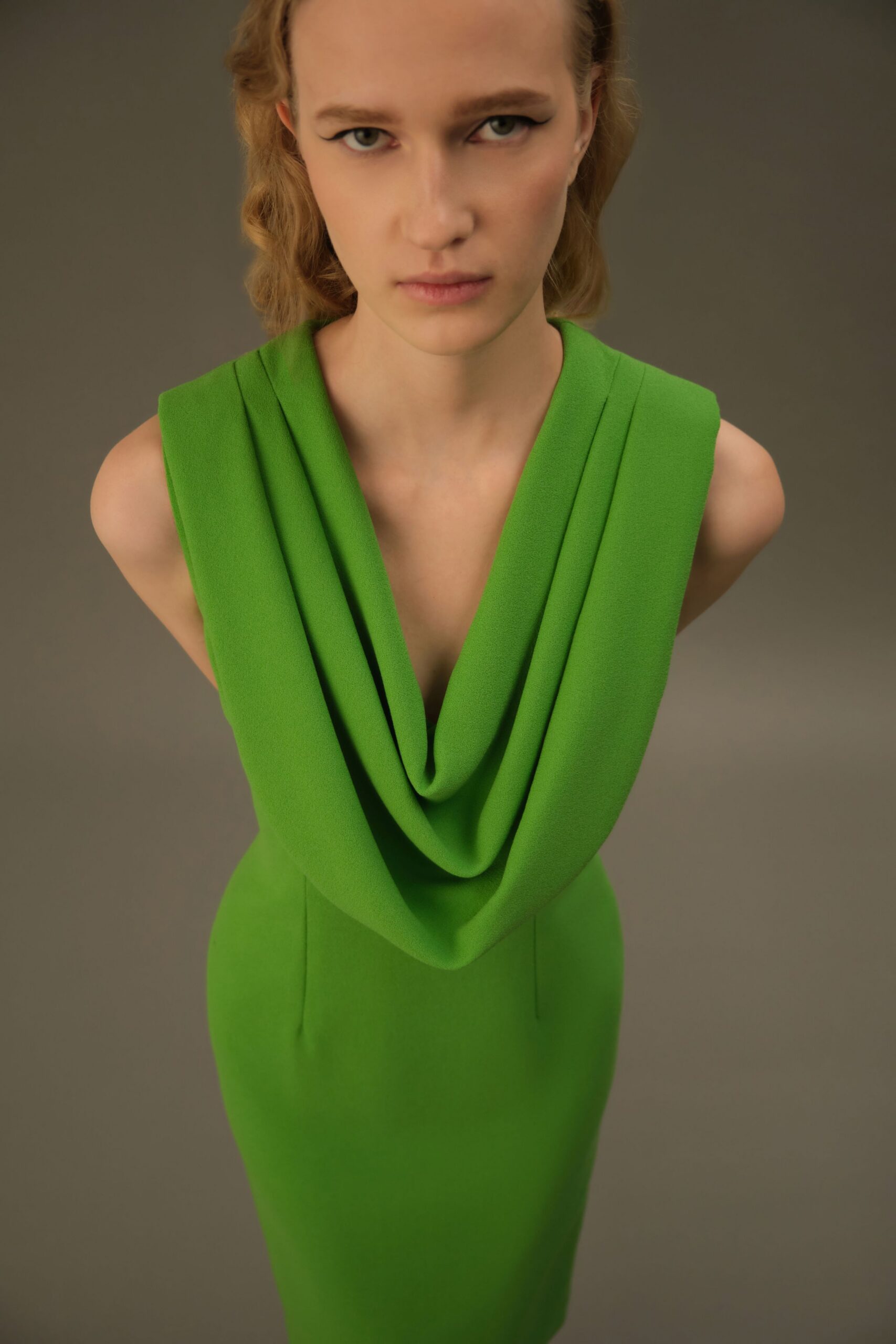 fitted green sleeveless dress