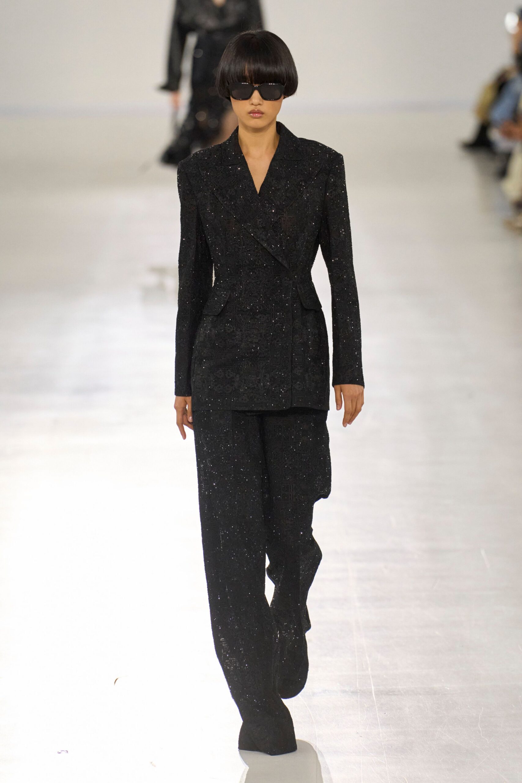black wool long-sleeve collared tailored structured buttoned suit