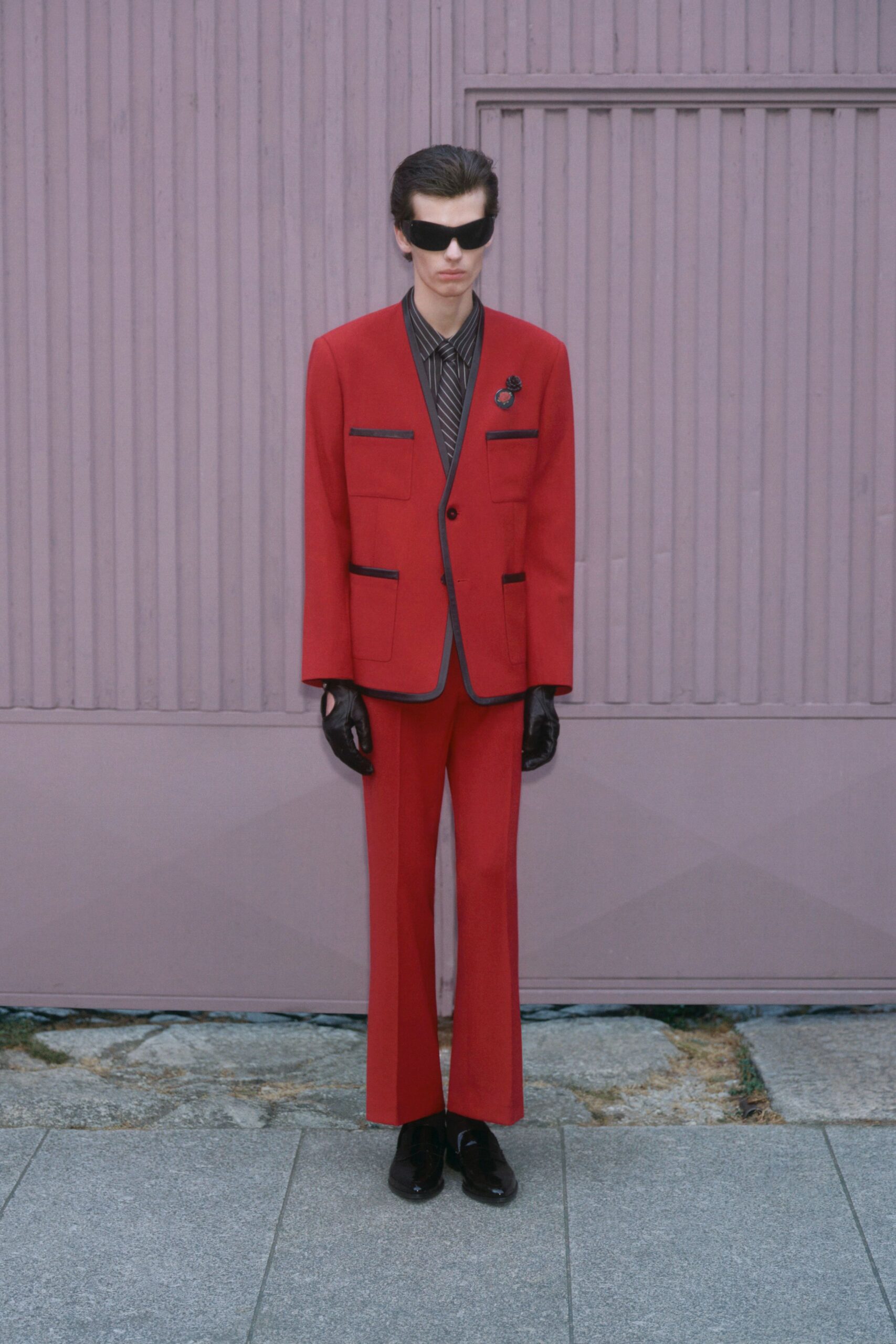 red long-sleeve collared tailored buttoned suit